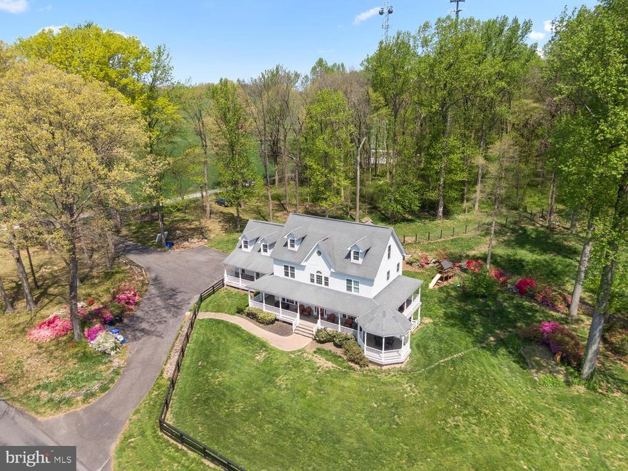 Welcome to paradise!  Over 4,000 square feet of living area plus a completely finished walkout basement!! This beautiful Victorian home with wrap around porch was built in 2004 and features a third level bedroom with private bath!  The lower level features an additional bedroom, full bath and kitchen!  The owner spared nothing when this estate home was built. Extras abound throughout. The open floor plan is just perfect for today's buyers!! In addition to several acres for horses, the owner has raised chickens for years and the eggs are AMAZING!! The outside space on this home is fabulous and the views from every window are spectacular! The play set with slide and swing conveys as well as the zip lines in the backyard. Much of the property is fenced and the home is nestled in a country-like setting with a close-in location. Conveniently situated between Baltimore and Washington DC, the home is also close to Olney town center and minutes from the local Sherwood High School and only a few blocks away from the neighboring Olney Mill with bike paths, tot lots, and basketball and tennis courts.