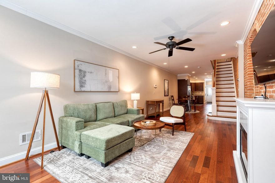 Bring your toothbrush and sheets to move right into your fully furnished Federal Hill gem! Tastefully renovated and furnished with a California vibe, enjoy Baltimore exposed brick charm with modern touches. Entering into the main floor the wood floors gleam against the exposed brick. The renovated kitchen has Quartz countertops and is fully stocked with everything a chef needs. Upstairs each bedroom has it's own en-suite bathroom and ample closet space. As every true Baltimore rowhome should have, the roof-deck is awaiting upcoming spring nights. The basement is perfect for a third bedroom or home office with it's painted exposed beams and plush carpeting. Offered from 6 months to 1 year, don't miss the opportunity for your ideal Federal Hill home!