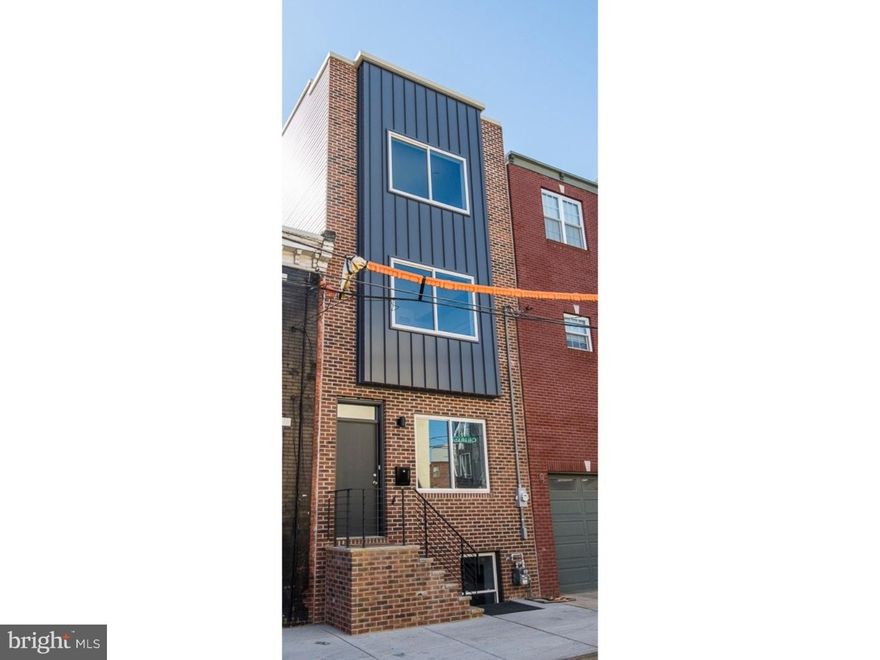 This brand new home must be seen to be appreciated! Move right in to this new construction home in fantastic Graduate Hospital, just half a block from the much anticipated Carpenter Green Park. Containing over 2,500 square feet of indoor living space over four levels, and luxury finishes throughout, this home is sure to please. The main level features an airy and bright open-concept space with professionally finished hardwood flooring and the central floating staircase as a focal point. An inviting kitchen with stone countertops, stainless steel appliances, soft-close cabinetry and a glass backsplash complete this level. The finished lower-level provides a ton of extra living space with high ceilings and a full bathroom for guests. Upstairs there are three bedrooms and two additional bathrooms. Both guest bedrooms have 6-12 feet of closet space, hardwood floors and large windows. The master suite, on its own floor, has a very large walk-in closet, private bath featuring double sinks and a jacuzzi tub as well as a large bedroom space with the continued hardwood floors and double window. The gem of this home, the roof deck space provides some of the most fantastic views of the entire city skyline, day or night. It will be the perfect place to relax or host guests on summer nights. Take a tour of this home today, you won't be disappointed! 10 year tax abatement approved.