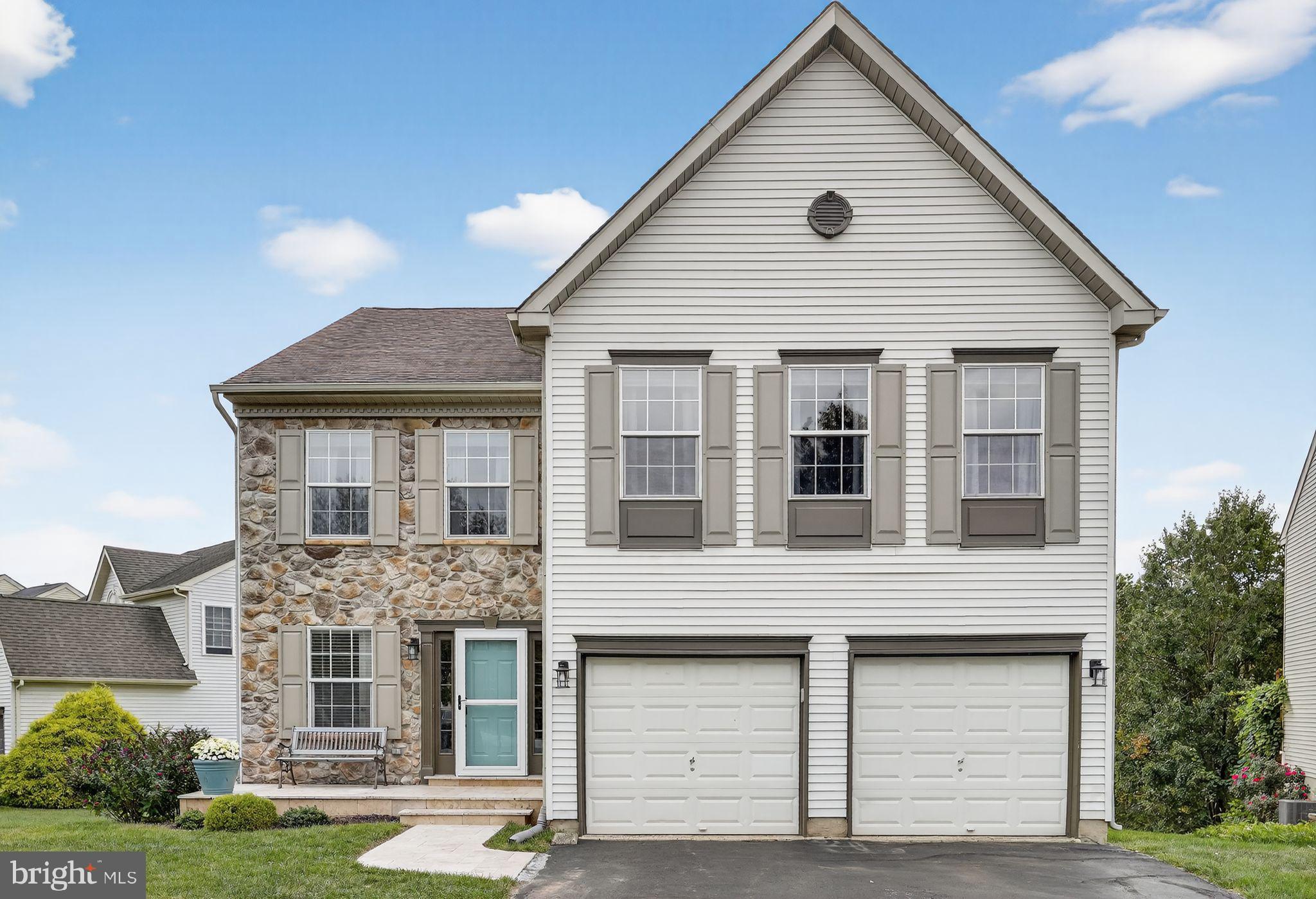 Nestled in the friendly Perkiomen Greene community of Collegeville, this 4-bedroom, 2.5-bath home offers 2,300 square feet of comfortable living space. A stone walkway and patio lead you to the front door, where you’re welcomed into a bright foyer with tile flooring, a coat closet, and a convenient powder room. Just off the foyer, the living room provides a cozy space with soft carpet and recessed lighting. The formal dining room, accented by a charming bay window seat, is the perfect setting for gatherings with family and friends.
The kitchen is designed for both function and style, featuring an eat-in area, stainless steel appliances, built-in microwave, slate tile floor, farmhouse-style porcelain sink with gooseneck faucet, and granite countertops. From here, step out onto the expansive Trex deck that overlooks the fenced backyard with peaceful wooded views and access to the nearby community walking trail. The kitchen flows seamlessly into the inviting family room, where a vaulted ceiling, hardwood floors, ceiling fan, and a dramatic floor-to-ceiling stone gas fireplace take center stage. Four windows—two at the main level and two set above—allow natural light to fill the space beautifully without overwhelming the room.
Practical spaces on the main level include a laundry room with storage closet and access to both the 2-car garage and the walk-out basement. The unfinished basement with shelving and sliding doors to the yard provides endless possibilities for storage, hobbies, or future living space.
Upstairs, the spacious primary suite offers a true retreat with a walk-in closet, ceiling fan, and a private bath featuring hardwood floors, double sinks, a soaking tub, and separate shower. Three additional bedrooms provide versatility—one includes a Murphy bed perfect for guests, while the others feature carpet, double closets, and ceiling fans with lights. A hall bath with double sinks, hardwood flooring, and a tub/shower completes the second floor.
With its wrought iron fenced yard, included washer, dryer, and refrigerator, and a location conveniently close to schools, shops and services, and the Perkiomen Trail, this home combines comfort, convenience, and charm in a setting you’ll love.