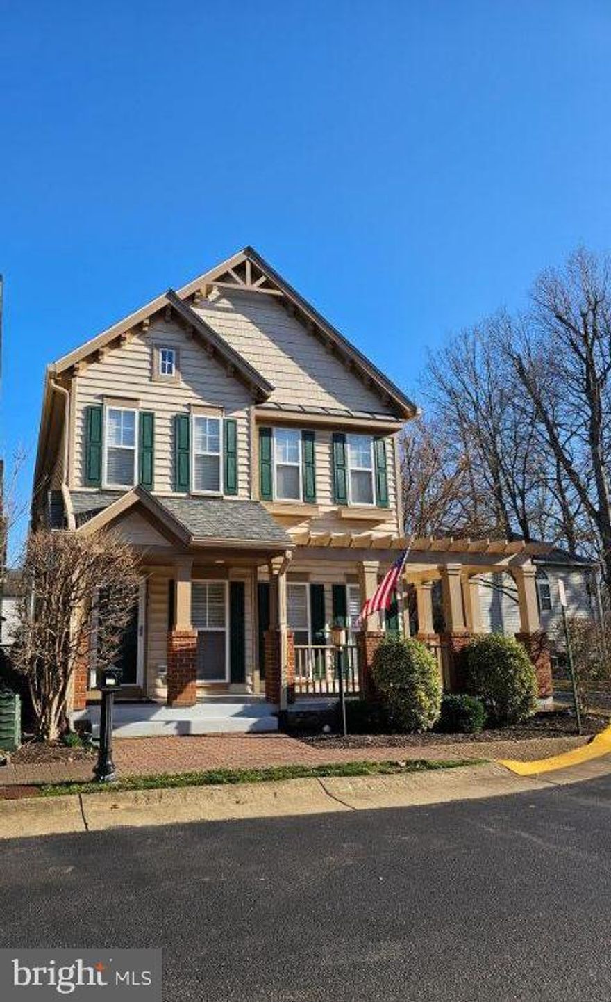 Welcome to this stunning single-family home located on a corner lot in the desirable Lorton Station Community. This spacious home has 4 bedrooms, 4 1/2 baths, and beautiful BRAND NEW hardwood floors throughout the main level. This property is sure to impress. Step inside to discover a well-designed floor plan that maximizes both functionality and comfort. The main level features an inviting living room with a fireplace, perfect for entertaining guests or relaxing with family. While the main level allows for lots of natural light, it also has wooden shutters for when you want complete privacy.  The dining area is ideal for hosting dinner parties or enjoying everyday meals. The updated kitchen boasts sleek countertops, ample cabinetry, large island and stainless-steel appliances. As you make your way upstairs, you'll find the serene primary bedroom suite, complete with a private en-suite bath and a custom designed walk-in closet. Two additional bedrooms along with a full bath complete the upper level. The lower level of this home offers a versatile space that can be used as a recreation room, home office, or even a guest suite. The possibilities are endless. Did I mention the in-law suite above the garage?  The home boasts a living space with its own full bathroom and walk-in closet that is separate from the main part of the home for extended family, an au pair, guest suite, etc. Residents of the Lorton Station Community enjoy a range of amenities including a community pool, tennis courts, playgrounds, and walking trails. With its proximity to major commuter routes, shopping centers, dining options, and the Lorton VRE Station, this home offers both tranquility and convenience. Don't miss the opportunity to make this remarkable home your own. Schedule a showing today and experience the best of Lorton Station living.