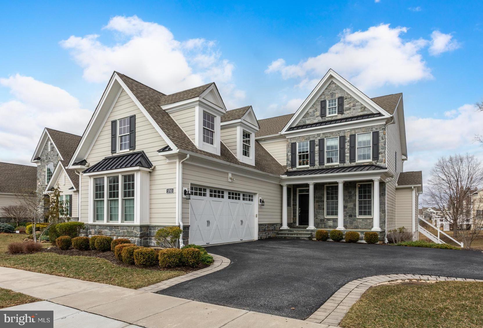 Welcome to this stunning Balen Model from the Merion Collection, nestled in the prestigious Liseter Community of Newtown Square. This meticulously maintained 4-bedroom, 3.5-bathroom residence offers a seamless blend of luxury, comfort, & modern convenience. A flagstone front porch & upgraded Heritage Mica stone exterior provide an elegant first impression. Stepping inside, a grand two-story foyer with a graceful curved oak staircase & dark engineered hardwood floors set the stage for the home's impeccable design.
The open-concept floor plan creates an effortless flow between spaces. A private study with double doors provides a quiet retreat, while the formal dining room features refined chair rail & crown molding, making it perfect for entertaining. Natural light floods the home, accentuating its spacious, airy atmosphere. The expanded gourmet kitchen is a chef’s dream, featuring top-of-the-line stainless steel appliances, including a Sub-Zero refrigerator & KitchenAid five-burner gas cooktop with convection wall oven. Custom white cabinetry, under-cabinet lighting, & striking Carrara marble herringbone backsplash complement the Caesarstone quartz countertops.
An expansive center island with seating makes the kitchen a hub for gathering. A butler’s pantry offers additional storage, while a walk-in pantry with floor-to-ceiling shelving ensures organization. The kitchen seamlessly connects to the sunlit family room, where oversized windows invite warmth & brightness. The living space extends to a full-width Trex deck with a custom-built pergola, perfect for outdoor dining,
relaxation and sunsets. Stairs lead to the beautiful backyard, creating a seamless transition between indoor & outdoor living.
The first floor also includes a stylish powder room, mudroom with two custom coat closets, & spacious laundry room with a utility sink. Two-car courtyard garage offers secure parking with direct access. Upstairs, the grand primary suite is a luxurious sanctuary with dual custom walk-in closets & a spa-like en-suite bath, featuring a frameless glass shower, soaking tub, double vanity with granite countertops, linen closet, & private commode.
Three additional spacious bedrooms provide ample closet space & share a well-appointed full hall bath with double sink & shower/tub combination. Custom-designed California Closets throughout the home ensure effortless organization. The finished walk-out basement expands the home’s living space, featuring high ceilings, solid oak stairs, & abundant natural light. The versatile space is perfect for a media room, game room, or lounge. A full bathroom adds convenience for guests, while an unfinished area houses the home’s mechanical, plumbing, & electrical systems, including an activated carbon water filtration system. Sliding doors open to a lovely paver patio.
Additional features include an ADT security system, Anderson windows, recessed lighting, & an energy-efficient dual-zone heating / cooling system for optimal climate control.
Liseter offers an unparalleled lifestyle with world-class amenities, including a beautiful clubhouse, full fitness center, infinity-edge pool, & multiple sports courts for tennis, basketball, & pickleball. Owners also enjoy a yoga studio, covered outdoor pavilion, scenic walking trails, a tranquil pond, community post office, & a historic carriage barn for community events.
The home’s prime location is just minutes from Whole Foods, Ellis Preserve, high-end shopping, and fine dining. Nearby prestigious country clubs such as Aronimink and Waynesborough enhance the area’s appeal. Close to top-rated public & private schools, including The Episcopal Academy & within easy reach of major highways for quick access to Philadelphia & beyond. This exquisite home offers elegance, modern convenience, & an unbeatable location.