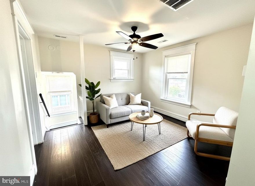 Freshly renovated 2nd-floor apartment featuring 2 spacious bedrooms, fresh paint, new bedroom carpeting, and brand-new energy-efficient windows. Enjoy central heat A/C, abundant natural light, and modern finishes. Amenities include onsite laundry, private parking, rear patio, and shared backyard. Just blocks from downtown Lansdale with shops, dining, entertainment, bus stops, and the train station nearby. Available now schedule a showing today!