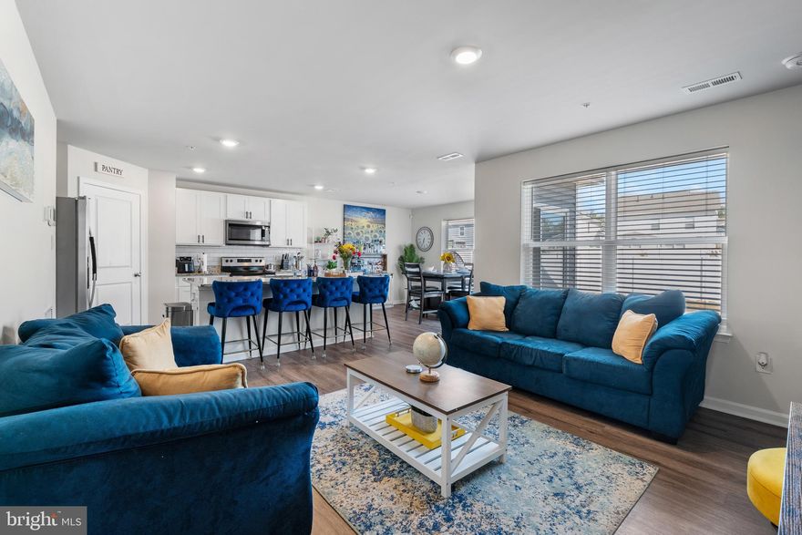 Welcome to 577 Fawn Meadow Ln — Nestled in the heart of the highly sought-after Pinegrove Community — known for its scenic stream valleys, mature forests, and resort-style amenities,  making it the perfect blend of tranquil and inviting. This stunning 2-year-old home shows the pride of homeownership and boasts 3 bedrooms, 2.5 baths, an open loft, and a two-car garage—all perfectly laid out to support your lifestyle.  From the welcoming front porch to walking in the front door, you’ll think you’ve walked into a decorated model home!  You’re greeted by a spacious foyer, a convenient powder room, and coat closet that opens into an expansive living area filled with natural light and seamlessly connects to the kitchen and dining areas—ideal for entertaining or everyday living. The designer-inspired kitchen shines with stainless steel appliances, modern cabinetry, a large island with seating, and a walk-in corner pantry.  Sliding glass doors lead to the patio and fully-fenced backyard, making outdoor gatherings and playtime a breeze. Upstairs, the owner’s suite is truly a retreat, featuring a spacious bedroom, an oversized walk-in closet, and a luxurious bathroom with a large shower. Two additional bedrooms, a versatile open loft, a hall bath, and a centrally located laundry room offers plenty of space and convenience for the entire family.  Located just minutes from Routes MD-301, MD-6 and MD-488, commuting is a breeze, and you’re close to St. Charles Towne Center, shopping, dining, and entertainment. This move-in-ready gem is a perfect 10, so don’t miss the opportunity to own this nearly-new home in one of Charles County’s hottest communities — 100% FINANCING AVAILABLE - Schedule Your Private Tour Today!