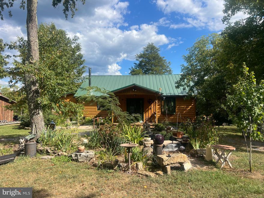 What a great home ! Totally remodeled top to bottom  home on 2.62 acres is ready for it's new owner! Granite counters, new floors ,new metal roof ,siding and so much more! Everything in this home has been completely  renovated in the last 6 years ! Perfectly situated on a nice 2.6 acre lot w/ two garden spots, a nice outdoor garden area and extensive decking this is really a great property . Would be an excellent full -time residence ,second  home or AirBNB spot in beautiful Hampshire Co WV so come out to Wild, Wonderful WV and take a look !