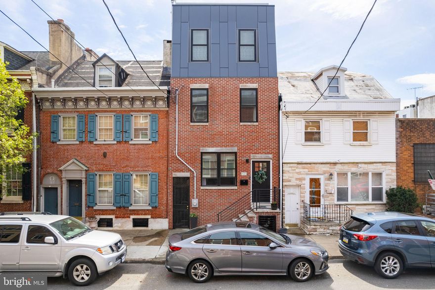 Available July 1st 2025

Step into your dream home at 122 Federal St, a brand new three-story masterpiece offering 3 bedrooms, 3 full bathrooms, a finished basement, and multiple private outdoor spaces—including a spacious rear yard and a show-stopping roof deck with panoramic views of the city and bridge.

Thoughtfully designed with a bright and airy layout, this home features gorgeous hardwood floors throughout and abundant natural light streaming through oversized windows. The chef’s kitchen blends modern farmhouse charm with high-end finishes, including waterfall quartz countertops, custom cabinetry, lantern pendant lighting, and stainless steel appliances. Sliding glass doors lead directly to the generous rear yard, ideal for grilling, entertaining, or relaxing.

The second floor includes two spacious bedrooms, each with ample closet space, and a beautifully tiled full bathroom. Retreat to the third-floor primary suite, where you’ll find a spa-inspired bathroom, an expansive walk-in closet, and gorgeous light pouring in from multiple angles.

An additional finished basement offers flexible space for a home office, media room, or guest suite—with its own full bath for added convenience.

Built by a respected developer known for quality and craftsmanship, this home includes a one-year builder’s warranty for peace of mind.

Located just steps from Queen Village in the highly desirable Pennsport neighborhood, you're surrounded by parks, waterfront trails, public transportation, shopping, dining, and local favorites. This is city living at its best—schedule your private tour today!