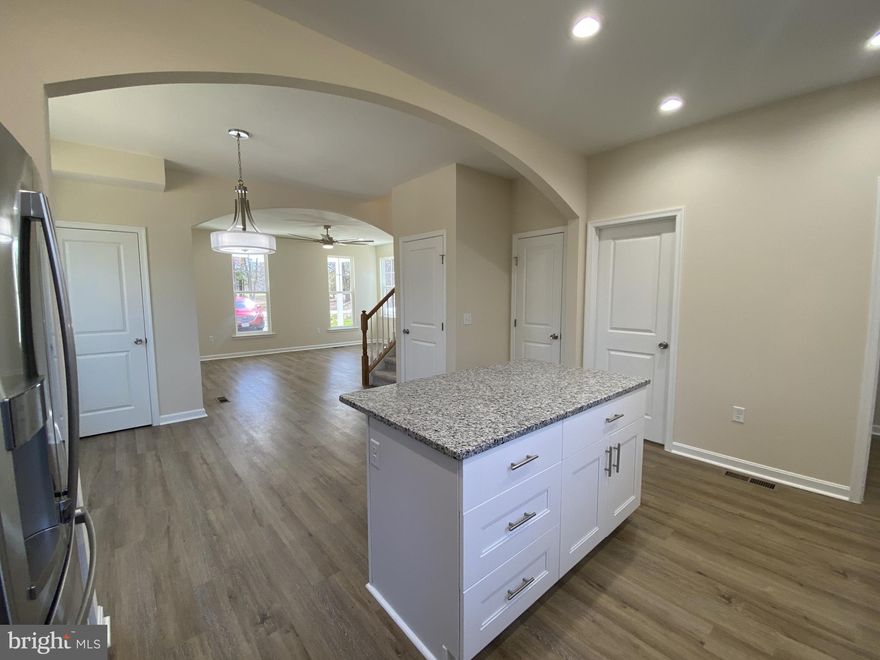 Huge $25k PRICE IMPROVEMENT! Absolutely adorable NEW CONSTRUCTION 2-story home in lovely Stratford Harbour. This home is 100% complete - no waiting! Step inside from the concrete front porch and the first thing you'll notice are the charming arched entryways separating each living space. Several closets and storage spots make this floor plan practical and livable, including the separate laundry room.  Amazing kitchen features all wood cabinetry, granite counters, and GE stainless steel appliances. Low maintenance, water resistant LVP flooring throughout the entire main level. Family room with electric fireplace and open floor plan with separate dining space. Upstairs, find 3 generously sized bedrooms to include a Primary Bedroom Suite with attached full bath and walk-in closet. This treasure of a home is 100% complete and ready for you! Agent related to Owner.