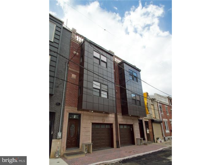 Customize Your Own Mansion!! This home is not 100% finished and can be customized! 4500 SQ' New Construction located on a QUIET, tree lined street in the Popular Grad Hospital area of Center City. GARAGE PARKING, and 4 decks are just a few amazing amenities. 4 Bedrooms+ AU Pair suite and a finished basement with 9' tall ceilings, Italian stone floors, separate theater room and tons of storage! The Master suite has a huge sleeping area, custom private tile bath, sitting area, huge closet spaces and a stunning ROOF DECK with spectacular views. other amenities: Wide plank Brazilian Cherry hardwood floors t/o, SMART HOME technology including Z-wave light switches that can be controlled from your cell phone, multiple HD quality security cameras with recording features, hard wired speakers everywhere!, 2 zones of heat and AC, rear yard and 4 decks, 9.5' ceiling heights,7' tall solid Mahogany doors, PELLA Architect series windows, Italian stone floors and tile in the 3.5 luxurious bathrooms, continuous flow hot water system, full cinderblock party walls for extra insulation & soundproofing, custom Italian Walnut railing tops even the garage floor is high end Granite tile! truly an amazing home just one block from the Avenue of the Arts, and walkable to all center city attractions and SUPER LOW TAXES! One of two homes available-1420 Pemberton is 100% finished!! Green features: High efficiency HVAC units, continuous flow hot water system, cinder block construction, 100 LED lights t/o, 16" front wall with Foam insulation.
