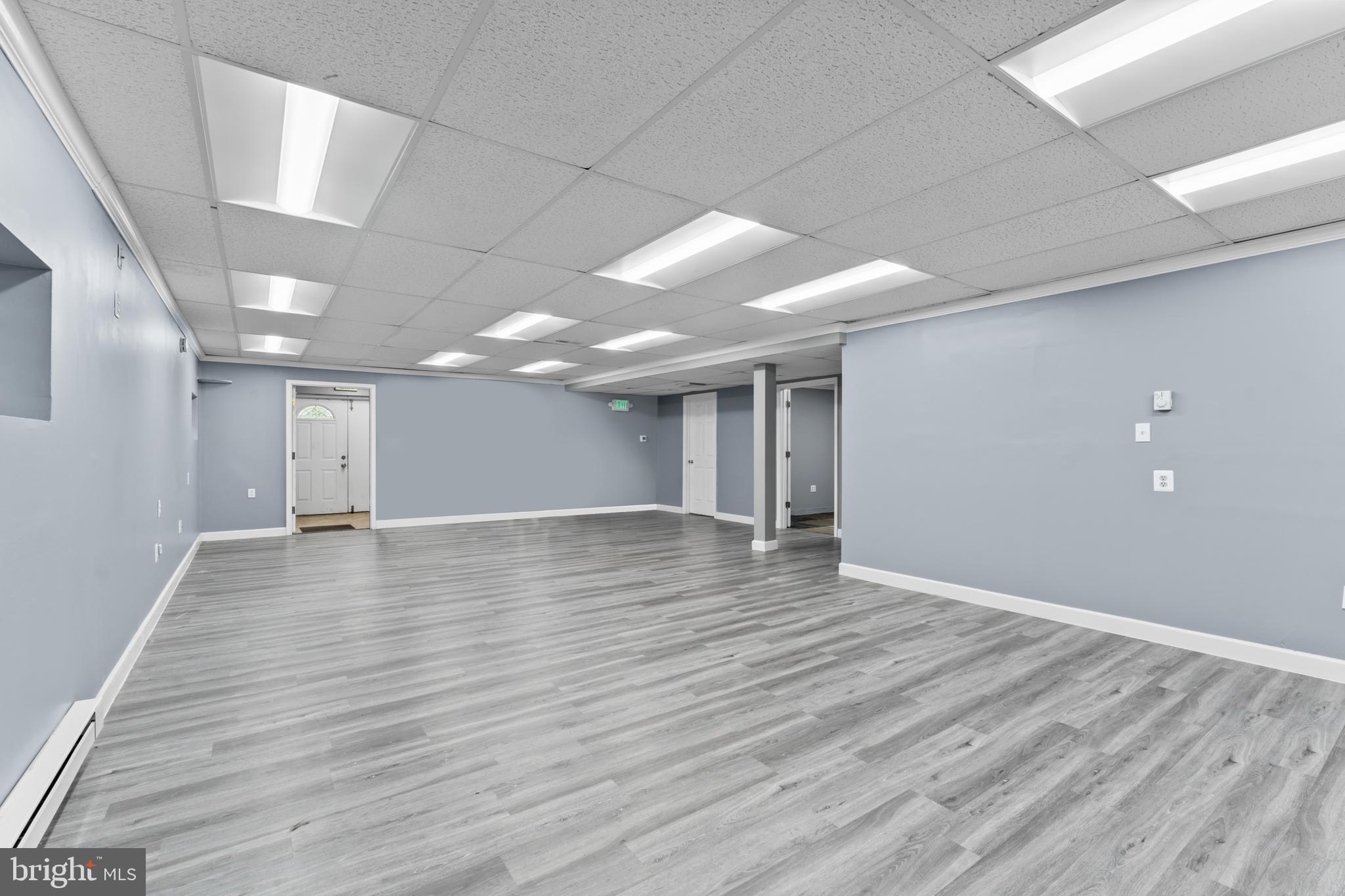 Prime Commercial Suite for Lease! $3,000/ month | Ideal for salon, retail, or office use | 15-20 onsite shared parking spaces for the building.
Position your business for success at this highly visible and easily accessible Belair Rd location, just minutes from White Marsh mall, major highways, and densely populated residential neighborhoods. This spacious commercial suite offers modern flooring, recessed lighting, and a flexible layout that's move in ready for your dream salon, boutique retail space, or wellness studio.
-The open main area is perfect for styling stations, displays, or a collaborative work environment.
-The private room can serve as an office , treatment space, or storage
-Located near I-695, Route 1 , and White Marsh Blvd for unbeatable visibility.
- Set in a lush , wooded backdrop offering a calm, professional feel.
Whether you are launching a new concept or expanding an existing brand, Suite LL101 at 7718 Belair Rd offers the space and location to make it happen.
Schedule your tour today and envision your business thriving here!