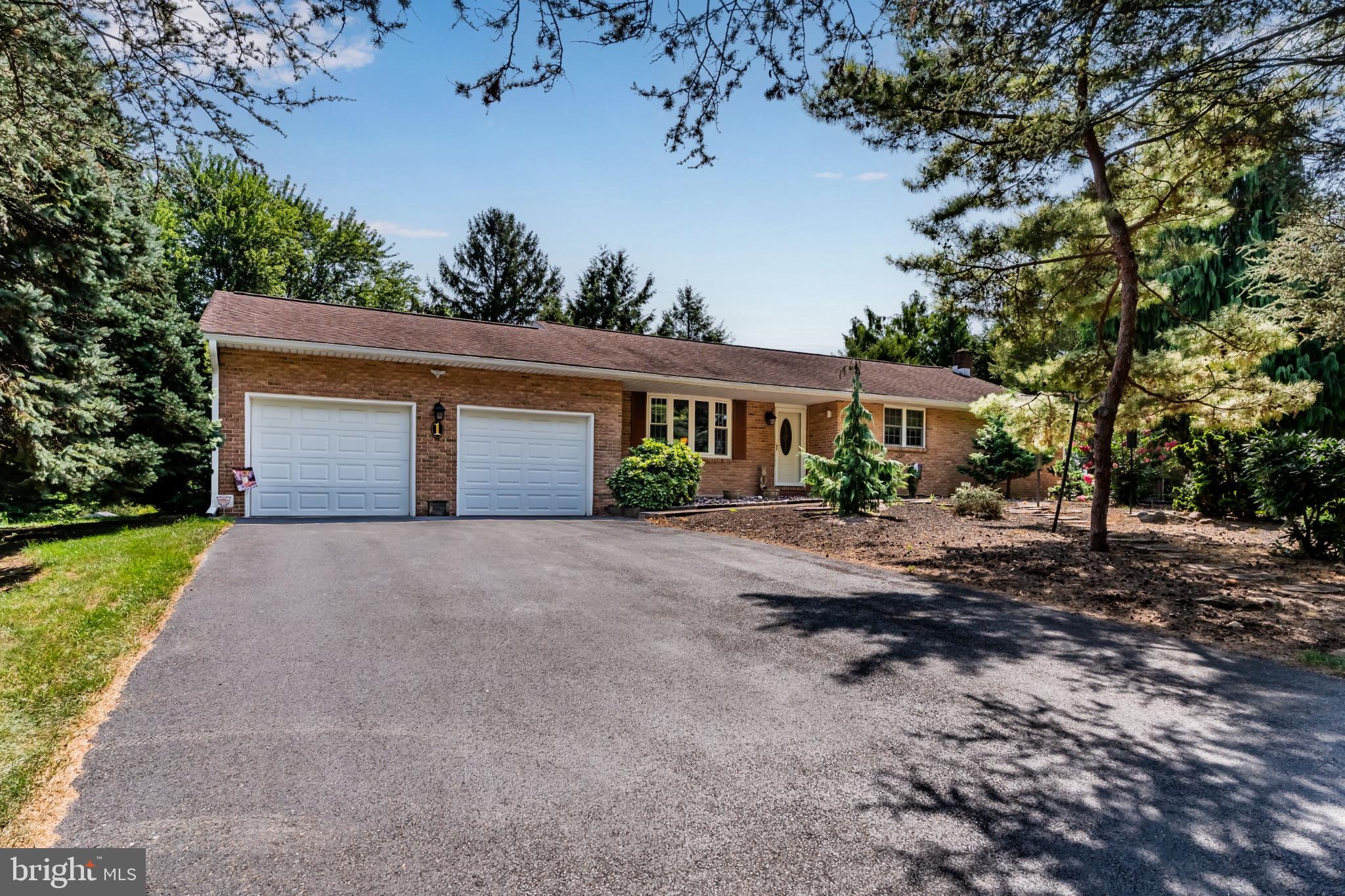 Nestled in the serene Greenbriar Meadows neighborhood, this charming ranch-style home offers a perfect blend of comfort and functionality. Built in 1978, this well-maintained residence boasts 1,522 square feet of inviting living space, ideal for someone looking to put their own style into a home. The windows were completely replaced in 2016, along with new mini-split units in 2020 in each bedroom and the main living to keep you cool during the summer. Set on a generous 0.58-acre corner lot that offers a level, private yard-ideal for outdoor activities or simply enjoying the tranquility of your surroundings. Parking is a breeze with a side-entry attached garage that accommodates two vehicles, along with additional driveway space for guests. The brick exterior and landscaping in the front yard is thoughtfully done and adds to the home's curb appeal. This home is just a stone's throw away from local amenities, including parks, shopping, and dining options. With its combination of comfort, convenience, and charm, this property is ready to welcome you into a lifestyle of ease and enjoyment. Don't miss the opportunity to make this delightful residence your own!