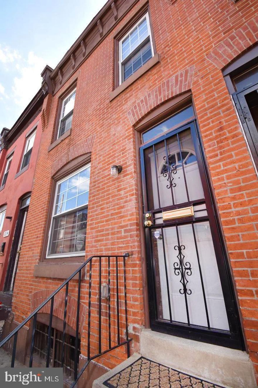 Hip and cozy, this hot Brewerytown, two bedroom home was rehabbed in 2014 and boasts Fantastic updates including central air conditioning, hardwood floors thru out, a rubber roof, new windows and all new mechanicals.  Enter this handsome brick front abode and the first thing you notice is the gleaming hard wood floors and the open concept design. The spacious living and dining area are flooded with natural light and the modern eat in kitchen has an abundance of all wood cabinets and modern appliances. There is also an outer entrance to the spacious rear fenced in yard, perfect for those summer barbecues and family gatherings. Upstairs, you will find two spacious bedrooms with lots of closet space, and a ceramic tile bathroom. The basement houses laundry facilities, mechanicals and storage space. Brewerytown has appreciated an amazing 17% in the last two years, is booming with new construction and is in a walk able distance to restaurants, galleries and shopping and public transportation. Do not miss your opportunity to cash in, set your appointment now!!