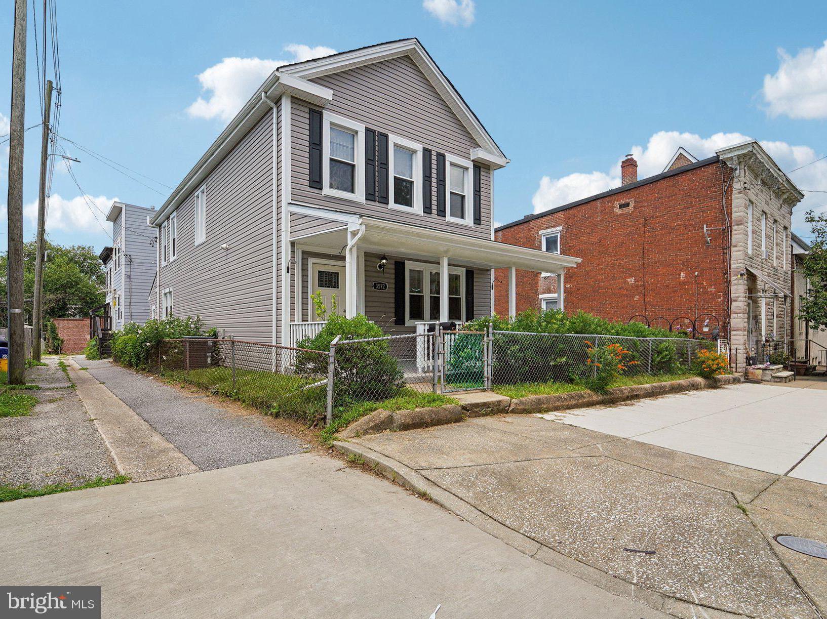Welcome Home to this Sought After Detached Hampden home with over 1,800 sq ft (plus basement) directly across from Roosevelt Park! Features 4 bedrooms, 2 full baths, and 2 half bath, including a hidden powder room on the main level and a finished half bath in the basement. Custom details throughout: crown moldings, hardwood floors, recessed lighting, granite counters, and stainless appliances. Enjoy 3 porches, private storage, and unbeatable walkability to shops and restaurants. Everything has been updated throughout for you to move right in...A true Hampden gem!