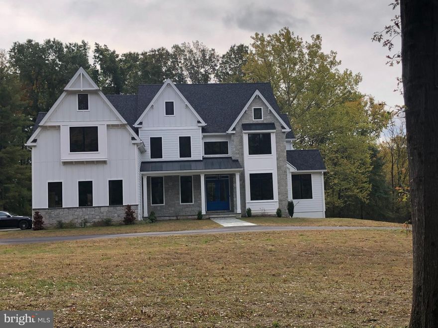 New Construction Craftsman Manor Home with Ultra High End Finishes and Appliances. This beautiful custom home sits on 3.1 acres on a quiet cul- de- sac street, 3 car oversize garage, walk out finished basement, elevator from the basement to the second floor, on site finished hardwood floors, 10 foot ceilings on the first floor and 9 foot ceilings on the second floor. Attention to detail and handsome curb appeal.