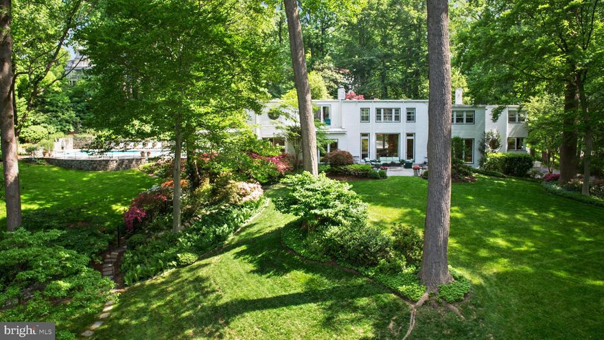 RINGSIDE -- so named because its first owners said from this location on the DC/MD line they could sit back and watch the goings on in Washington.  Beautifully sited on 2.7 acres overlooking the reservoir, this is a special property in every way.  Accessed by a long winding private drive, this iconic modern house has fabulous views, terraces, lovely grounds, a pool and a tennis court.  The rooms are spacious and most have water views.  You will feel that you have gone many miles into the country but instead you will have arrived there in minutes.