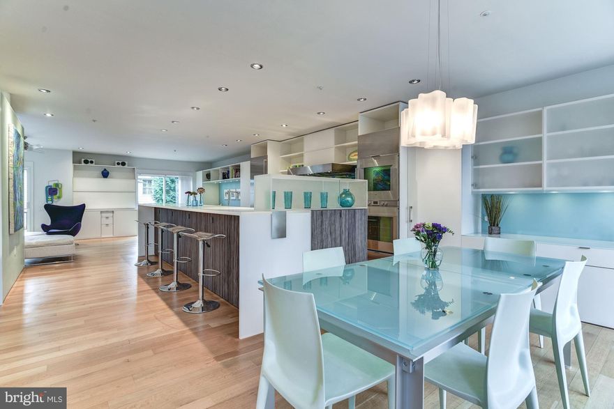 Wow! Spectacular Contemporary Renovation!One of a kind high-end gourmet kitchen-48" Thermador cooktop Gaggenau ovens.Open floor plan with big island,built-ins, white oak floors, plantation shutters, and recessed lighting.Upper lvl has 2 BR, 2 full BA and vaulted ceilings plus BR converted to Den/office with window.Lower level w/BR &full BA Ensuite.Garapa wood deck.Near Whole Foods,METRO,Pike&Rose.