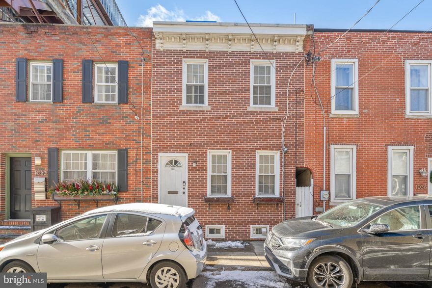 Nestled just off Washington Ave in Graduate Hospital, 1038 S Bouvier St is an updated 2-story home offering 2 bedrooms, 1.5 bathrooms, a finished basement, and a sought-after location close to dining and shopping. A quiet, low-traffic block leads to the classic red brick exterior. Inside, gleaming hardwood floors stretch across the open main level while a pair of windows pour in natural light. There's plenty of space for separate living and dining areas, plus the kitchen is fitted with a full suite of appliances, including a dishwasher. At the rear is a bonus room that could be used as an office or pantry storage. Additional living space is found in the finished basement, perfect for a den or gym, along with the laundry and a half bathroom. Up on the second level, a large, bright, and airy primary bedroom is at the front, featuring hardwood floors, double closets, a ceiling fan, and tall windows. Down the hall is a second bedroom and a full bathroom. 1038 S Bouvier St's prime spot in Graduate Hospital earns a Walk Score of 92 with top-rated restaurants and friendly shops steps away, including Chick's Bar & Grill, Martabak Ok, and El Amiguito Mobile Taco. Target, PetSmart, and Sprouts Farmers Market are among the stores nearby, plus Chew Playground is around the corner. There's also easy access to Rittenhouse Square, public transit, Broad St, and Grays Ferry Ave. Schedule your showing today! This home is currently rented until May 1st at $1,935.00 per month, but the tenants are cooperative and will allow showings