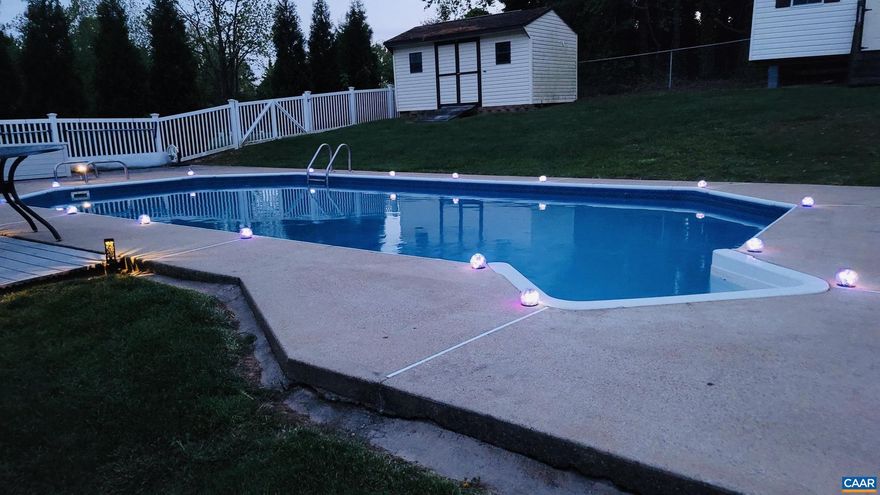 Summer is heating up refresh in your personal in-ground pool which has been consistently professionally maintained! Take a look at this lovely home located in a prime spot in Augusta County (desirable Riverheads School District), benefiting from lower taxes but so convenient bordering the outskirts of the City of Staunton.  Minutes from downtown Staunton, shopping and interstate access, this spacious 3-bedroom, 2 1/2 bath home features an open-concept with plenty of space. Enjoy almost 2000 sq ft... perfect for both everyday living and entertaining. Step out back to a large, fenced-in yard, ideal for family gatherings, cookouts, and your furry friends! Cool off in your very own in-ground pool?ideal for soaking up the sun and making the most of those warm Summer days! The property also includes two large outdoor sheds for all of your storage needs. Other recent upgrades include: newer roof, vapor barrier installation in both the crawlspace and attic, and luxury vinyl flooring throughout. Don?t miss this opportunity and schedule your showing today!,Solid Surface Counter,Wood Cabinets