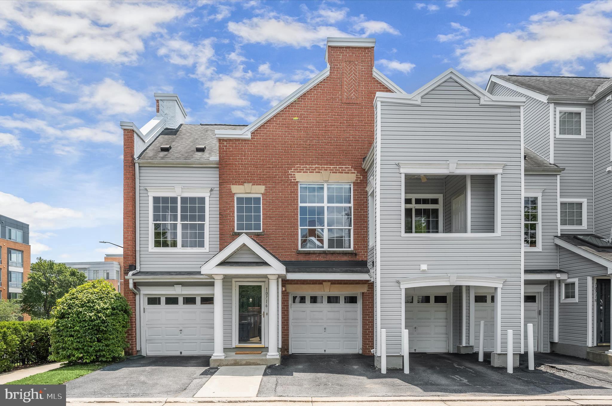 Beautifully updated 2 bedroom, 2 bath condo in the highly sought-after Whitney at Town Center community. Enjoy amenity-rich living in vibrant Columbia, with shopping, dining, entertainment, and major commuter routes just moments away. This stylish home features an open floor plan with soaring vaulted ceilings, recessed lighting, and Brazilian cherry hardwood floors throughout including the bedrooms. The remodeled kitchen showcases rich wood cabinetry, an island breakfast bar, granite countertops, and stainless steel appliances. The spacious primary suite offers a vaulted ceiling, a large walk-in cedar-lined closet with custom organization, and a luxurious en suite bathroom with a granite dual vanity and an oversized glass-enclosed shower with dual shower heads and built-in benches. The second bedroom also has a high vaulted ceiling, and the guest bathroom is appointed with a granite vanity top and glass enclosed tub. Enjoy your own private balcony and an attached garage that’s been beautifully finished with custom built-in storage. Community amenities include a picnic area with gazebo and access to all of Columbia's scenic hiking paths.