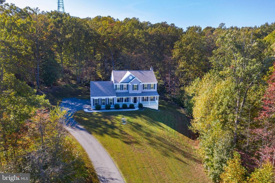 This well maintained home is ready for a new owner. Located at the end of a quiet cul de sac and surrounded by trees, this setting is hard to beat. The full basement is ready to be finished. It comes complete with a full walk-out to the rear yard. The living room and dining room are split by the centrally located staircase. The living room would be a great place for a home office or play area. This open floor plan has the kitchen located next to the family room. Located off the back of the kitchen is a sunroom with a door to the large rear deck. On the second floor is the large Owner's bedroom with a large walk in closet. Relax after a long day in the garden tub in the Owner's bath. One of the things I love most about this house is the windows! There's plenty of them, adding light from all directions. The 3 car side entry garage allows for plenty of storage. Make sure you see this home TODAY!