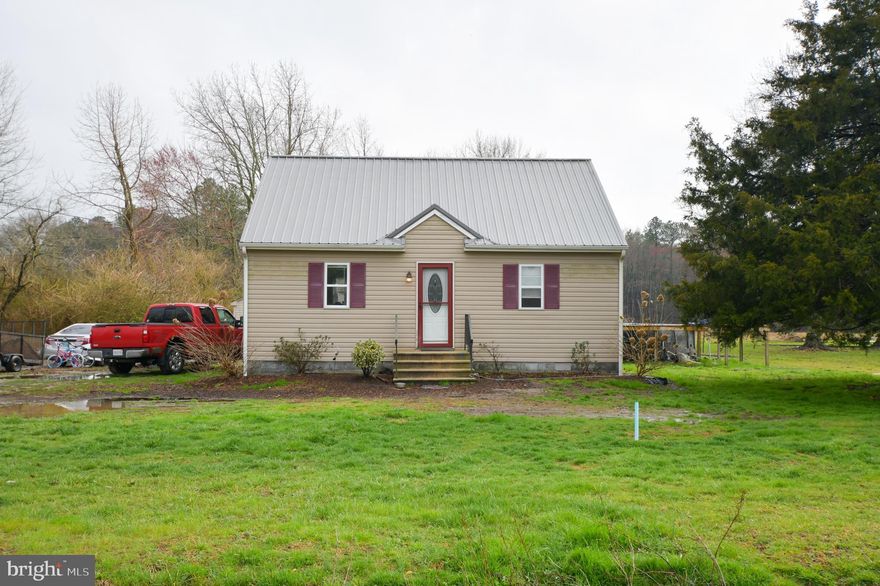 Nestled on just over 4 acres in Princess Anne Maryland, this cozy 3 bedroom 1 bath home offers plenty of space for farming, pets, adventures, etc. Inside the home offers an open floor plan, 1 bedroom and bathroom downstairs, and 2 bedrooms upstairs. Outside, you'll find a back deck, above ground pool, detached garage, and room to roam. Perfect for the first time home buyer or someone looking to downsize or move to the country. The possibilities are endless with this home!