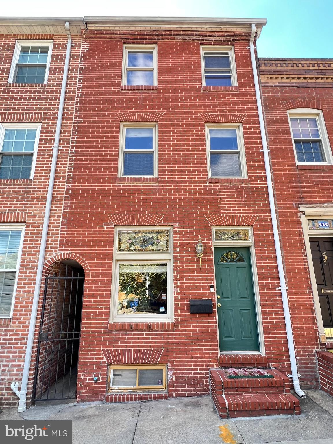>>OPEN HOUSE SAT, 10/25/25, 10 AM TO 11:30 AM.<< This 3 BR, 2.5 BA home, located solidly in uber-fun Canton, has over 2400ft.² of space and is filled with character! From the original wood floors to the exposed brick to the super cool spiral staircases to the private backyard, this is a lively and wonderful place to call home. The primary bedroom is spacious, and features two decorative fireplaces and ample closet space. The second upper level bedroom suite is huge and could be a terrific guest area with its half bathroom and large bonus hangout area. It could also be ideal for a roommate scenario, with ample space for an easy second living room and ample furniture placement, as well as the potential for a deck area off of this space. The basement bedroom is served by a full bathroom with a walk-in shower, another fantastic guest or roommate space. Check out the fully fenced patio, ideal for quiet dinners! Close (but not too close) to bars and restaurants, this home is about five minutes away from The Can Company and all of the wonderful establishments on Boston Street.
