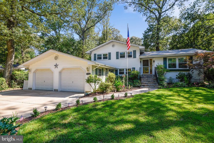 Rarely available in Sunrise beach. Four level split home with Two car attached garage PLUS one car detached garage (with electric) in the back perfect for a workshop. This home boasts Four bedrooms and Three full baths. Updated kitchen with Granite Countertops with breakfast bar.  Cozy Family room has Wood burning Fireplace and Built-ins.  Walk out to multiple decks and new firepit, Playset conveys, fully fenced yard for your pets!  Lower level bedroom with a full bath could easily be converted into a lovely in-law suite.  Freshly painted throughout and new carpet.*  New A/C Condenser* New Water Filtration System* Pull down Attic,*Ring Door Bell*Mudroom with Built-ins * Whole House Generator Hook Up in place*Hardwoods under carpet*