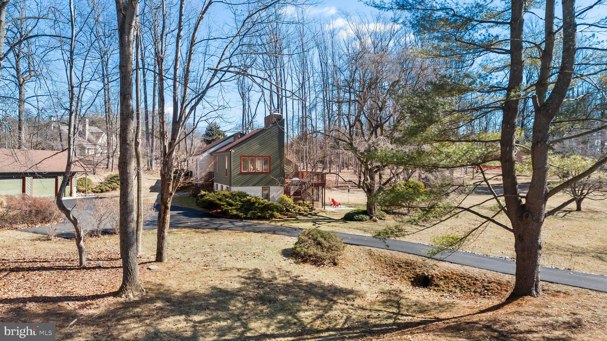 Welcome to 7 Top of the Oaks in Chadds Ford Township! Nestled on a tranquil cul-de-sac street in one of the most sought-after neighborhoods in the Unionville Chadds Ford School District. This stunning contemporary home seamlessly blends sleek, modern design with inviting warmth. It is surrounded by beautiful landscaping and sits on an awesome 2-acre level lot. The attractive, oversized, 2-car detached garage adds to this home's many great features. This home was custom built by the current owners in 1980. It is a 3 Bedroom, 3 Bath home with a floorplan that is going to appeal to a Buyer looking for something really special in their new home. The floorplan is unique with a really cool vibe. The main level features an eat-in kitchen/breakfast room with quality wood cabinetry and granite counters. It is open to a large (31x15) family room with gorgeous floor to ceiling 2-sided stone wood burning fireplace. The dining room enjoys the other side of the family room fireplace and has sliding doors to a back yard patio. There is also a separate game room, full bath and laundry/utility room on this level. You enter the home into the pretty second level foyer. There are French doors from the foyer to the added bonus of a large (26x12) second-floor great room with a gorgeous Chester County stone fireplace. It has sliding doors to a huge deck with incredible views. This floor also has an office, 3 bedrooms and a hall bath. The primary bedroom has 2 closets and a beautiful bath with a walk-in tiled shower. Everything about this home makes it a great place for everyday living and entertaining friends. It has been maintained beautifully by its current owners which adds value. This property is in a prime location, making it convenient to the schools, shopping, major roads, and great restaurants. It is definitely a one-of-a kind special place to call home.