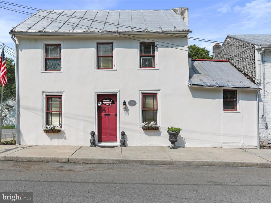 A beautiful combination of colonial history, artisanal workmanship and modern accessories, this property was built Circa 1750 on the oldest street in Charles Town, WV. This log home now recognized within the historic district of "Old Charles Town" and is one of the oldest properties in West Virginia. Much care has been given to accentuating the value of hand hewn woodwork, heart pine floors and handmade brick.S. Water Street is a row of log homes predating the founding of Charles Town, strategically built near the consistent water supply of Evits Run.  Uniquely located, this neighborhood borders farm land, a new city park / nature area and Evits Run but still offers easy walkability to stores, restaurants, coffee shops, and breweries. A charming backyard offers room to entertain guests with minimal maintenance. Space in attic available for third bedroom opportunity. Walking distance to downtown restaurants, stores and farmers market! Great opportunity to own a piece of history and a gorgeous home! Currently being run as an active airbnb and includes all furnishings, etc. as part of the sale.