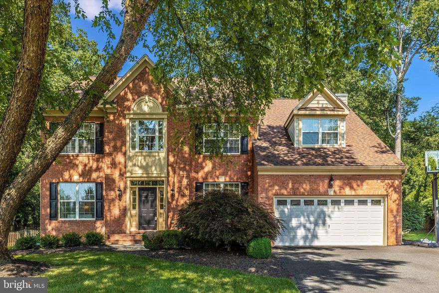 Welcome home to 7704 Saint George Place! This wonderful 5 bedroom 4 1/2 bathroom traditional colonial home, situated at the end of a cul-de-sac, in  the highly coveted Holly Hills community, is sure to check off every box! Stepping into the main level of the home you'll find your formal living room and dining room, beautifully renovated kitchen with breakfast room, sunken family room with cozy fireplace, executive office, guest half bath and convenient main level laundry. Making your way to your upper level you'll find your expansive primary suite with spacious bedroom area, private den, large walk-in closet, and beautifully renovated private bath. The upper level also features two additional bedrooms with a shared full bath, and a secondary suite with a private full bath. The lower level of your home features a wet bar, rec area, family room with fireplace, plus a fifth bedroom and full bath. Outside you'll fall in love with your spacious deck, large fully fenced backyard, plus a convenient storage shed and two car garage. To top it all off the home is zoned for the highly rated Oakdale school district, offers easy commuter access to I-70 and I-270, is an easy drive to three international airports, and is just minutes from shopping, dining, and historic downtown Frederick. Don't miss your chance to call this amazing house your very own!