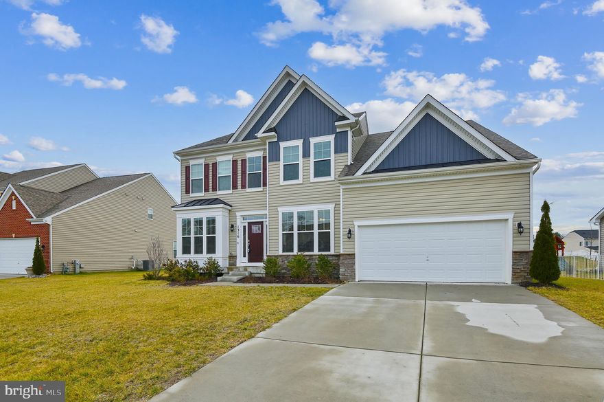 This D.R. Horton, Covington model is a must see...built in 2019 with all of the popular features you would expect in an upscale home. Upon entering, you'll notice a 2 story expansive entry foyer. The flooring on the main level is upgraded, maintenance free, custom laminate. The dedicated, formal dining room has crown moulding and chair rail as does the open living room. Walking into the sunny, expansive family room/ kitchen area, one immediately recognizes this is an ideal gathering space for entertaining or family time. The kitchen features a gas range, quartz counters, all SS appliances and a large center island breakfast bar w/ double sink. Heading upstairs, there are four distinct bedrooms and 3 full bathrooms. The primary bedroom has a ceiling fan, walk-in closet and fully appointed primary bath. The bath includes a soaking tub, double sink and separate shower. The 2 other full baths incorporate tub/shower combinations. All bath flooring is tile. The huge, unfinished lower level features a rough in for a full bath and a slider as a walkout to the back of the home. Plenty of storage space here! This gem is situated on a large .34 acre level lot with a fenced backyard, custom paver patio and paver firepit. Parking is a breeze with a 2 car, attached garage and a poured concrete pad for 4 vehicles...this is maintenance free living at it's finest!