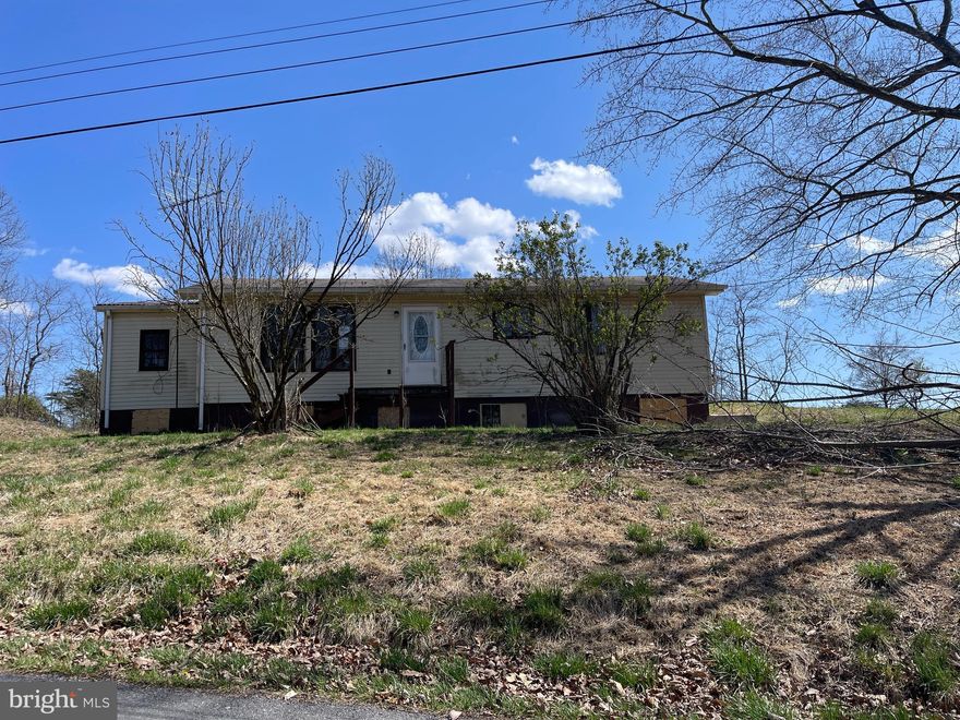 PRICE REDUCED!  Looking for peace & quiet?  With a little TLC, this Rural located Ranch style home just maybe the answer! 
Located Just off of Winchester Grade Road you are not too far from local attractions such as Sleepy Creek wildlife management area & Cacapon State Park.  Berkeley Springs and Winchester, VA are also not too far away.  Come check out this opportunity and see the potential it offers!