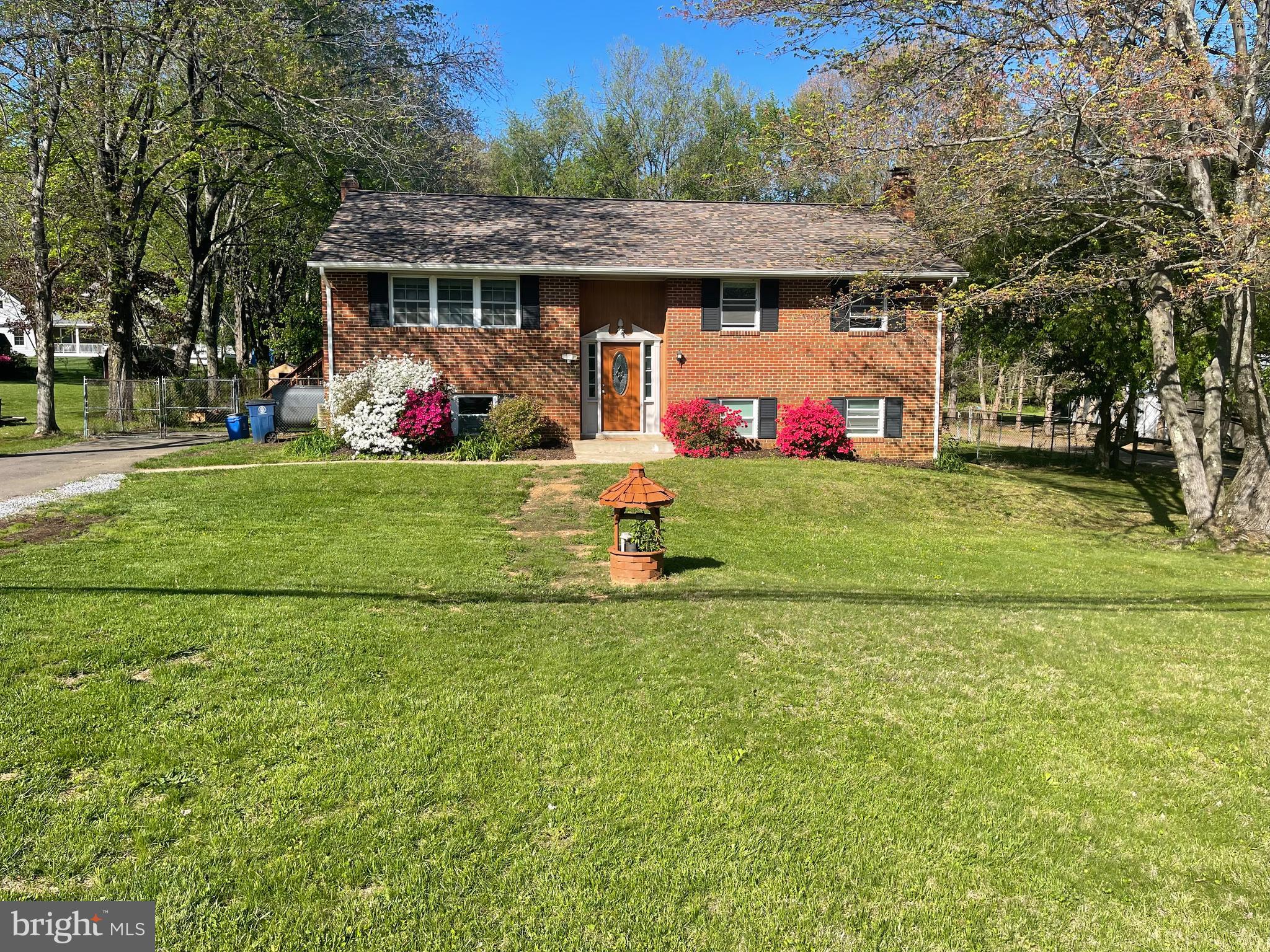 Motivated Seller. Light and roomy single family home with a large fenced in backyard. It offers full open floor plan living space area on two levels, fairly new roof, well maintained yard, and great schools. The upper level includes a large kitchen with hardwood flooring, three bedrooms with good-sized closets in each, two full baths, and plenty of sunshine. The lower level has a large living room with a kitchenette, two bedrooms and a full bath, fireplace and access to the paved patio and more than half the acre of beautiful backyard. OWNER WIIL CONSIDER RENT TO BUY OPTION OR MONTHLY RENTAL IN THE AMOUNT OF $3,400,00 A MONTH.