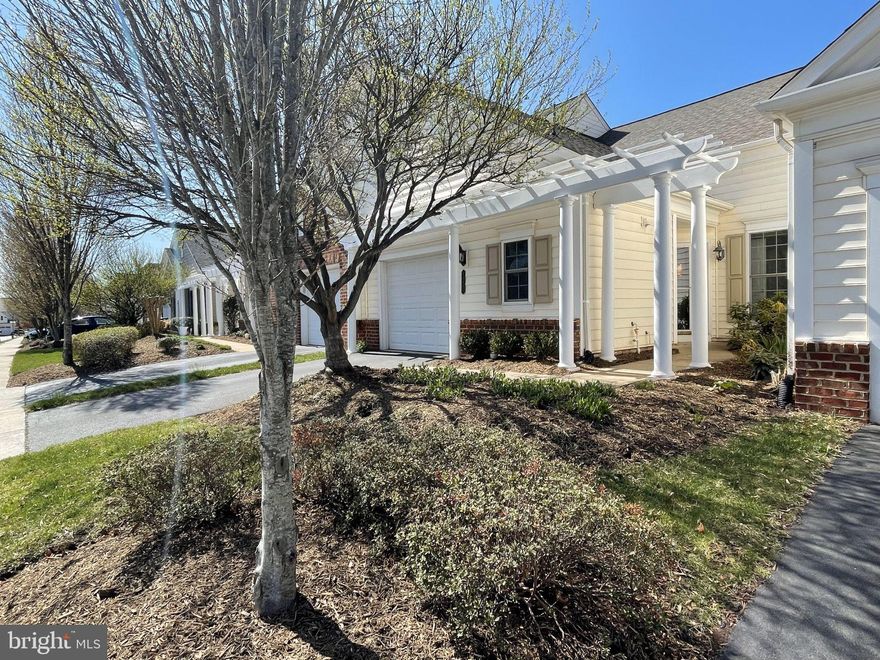 COME AND SEE YOUR NEW HOME in the highly desirable Potomac Green 55+ active adult community! This inviting model offers true main-level living with 2 bedrooms and 2 full bathrooms in a thoughtfully designed open floor plan. The spacious kitchen is a chef’s dream, featuring large cabinets, plenty of countertops, a GAS COOKING , built-in microwave, and a dining room just off the kitchen. 
The owner's suite boasts two walk-in closets and an en-suite bath. The second bedroom includes a walk-in closet and direct access to the second full bath, offering comfort and privacy for guests.
Additional highlights include a laundry room off the kitchen with ample storage and an oversized one-car garage offering extra space for storage. Enjoy peace of mind with major updates, including a new furnace and AC installed in 2023, a new roof in 2021, and new carpet in 2022. Plus, the home features new stainless steel appliances for a modern touch. Located in the vibrant Potomac Green community, residents have access to a beautifully appointed clubhouse with a state-of-the-art fitness center, aerobics room, walking track, grand ballroom, and game rooms with billiards and ping pong tables. The community also features a library with computers and more. Outdoor amenities include a pool, tennis, pickleball, and bocce ball courts, as well as garden plots and scenic walking paths throughout the neighborhood.  So Close to restaurants and shopping. Seller may need a rent back.