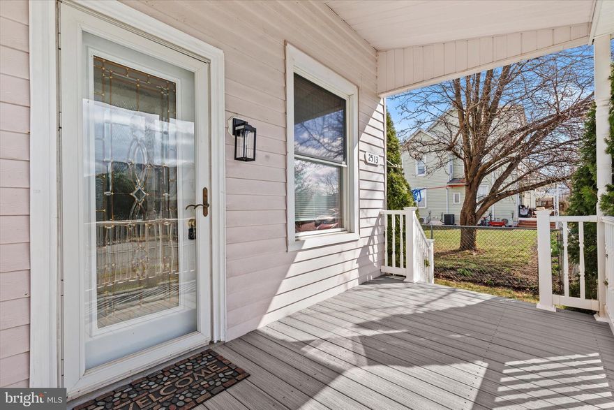 Walk through the welcoming front porch and enter the  freshly painted and floored open-concept living and dining rooms.  Entertain in the brand new eat-in kitchen with central island and breakfast bar, complete with granite countertops and new appliances. A renovated laundry/mud room and modern half bath complete the first floor while the large back deck and fenced-in backyard add to the outdoor entertaining and living possibilities! 

The second floor features three freshly carpeted and painted bedrooms with ample natural light and a contemporary brand new full bath. Retreat to the third floor where a spacious fourth bedroom with additional attic storage are found.   The full basement and area above the laundry room provides even more storage space.

Recent updates include brand-new kitchen and bathrooms, plus new flooring, fixtures, and fresh paint throughout!! A newly installed HVAC system ensures year-round comfort. Exterior upgrades include new porch flooring , rubber side roofs, and sidewalk. 

Situated in a quiet, walkable neighborhood, this home is truly TURN-KEy and ready for you!!