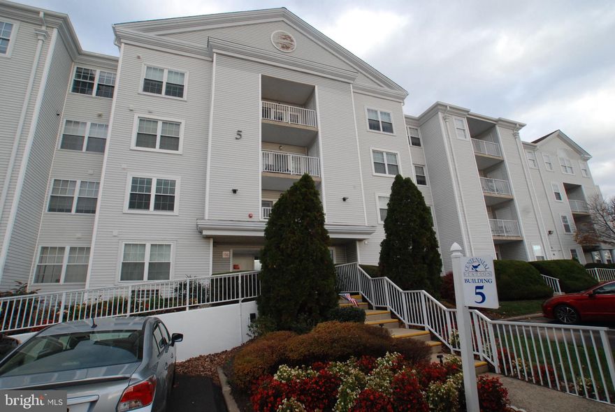 For 12/19 Open House (12-2)  come to the main entrance of Building 5.  Brand new 2BR/2BA listing at Centennial Station (55 Plus  Housing). Premium condo in a premium building (one of the few buildings with its own card room) with premium finishes. One Of The Largest 2 Br's made here at 1,408 square feet.  Extremely clean and shows like a beautiful model home.  Upgrades include the following; gleaming ceramic tile in foyer, dining room, and kitchen; handsome kitchen backsplash, granite breakfast bar;  tiled window sills; replacement windows; tiled balcony; custom window treatments; upgraded tile in both bathrooms; HVAC replaced in 2012.  On top of that, the Seller is providing a One Year Home Warranty for your peace of mind.   Relax on your balcony and take in the ball field views with SouthWest Exposure and beautiful sunsets. The upgraded carpets are "Like-New".  Enjoy the breeze from the ceiling fans in the living room and both bedrooms.  Extra recessed lighting sets the mood throughout.  And you won't believe the amount of closet space with two walk-ins and an outside storage closet on your balcony. You'll get the convenience and low maintenance advantages of a condominium blended with single home room sizes. All that and the taxes are a bargain at $4,159/year! Comprehensive condo fee includes trash, snow, water, sewer, cable television, security system monitoring, master policy insurance, library, indoor heated year round pool, exercise room, tennis court, card room, and ball room. For your convenience, there is even a small commercial area inside the Activity Center featuring a hair salon, restaurant, dentist, financial planner, and real estate office offering free notary, copying, and faxing for residents. Currently the association has approximately $1.2M in reserves. No dogs except service animals.