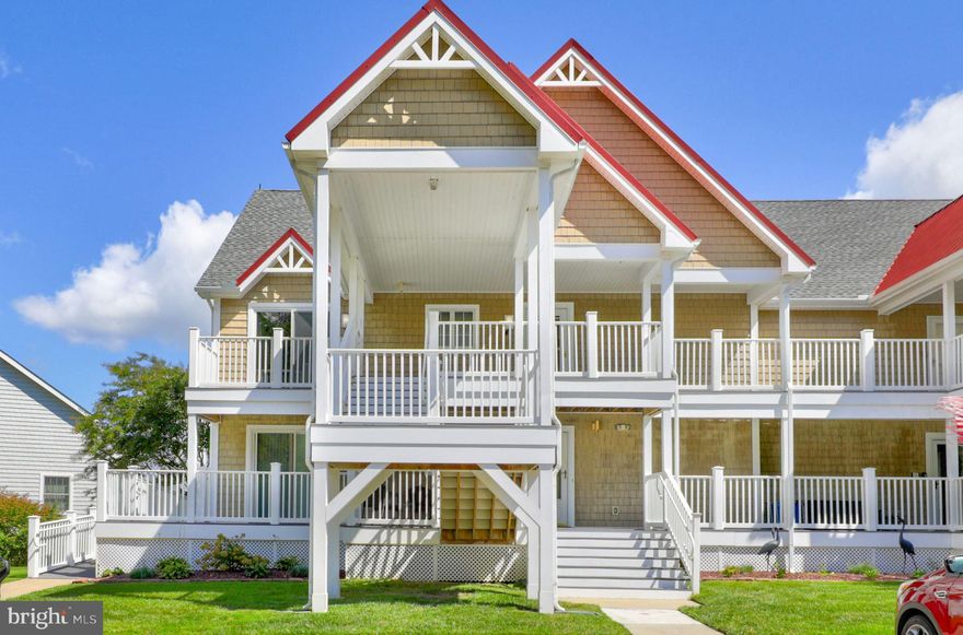 This coastal home, ideally situated in West Ocean City with lovely pond views, offers year-round resort living. Step into the welcoming kitchen, featuring pristine white cabinets and appliances, complemented by a stylish kitchen tile floor. The kitchen features a convenient breakfast bar, double sink, and plenty of counter space. The dining area seamlessly flows into the living room, highlighted by crown molding, a cozy fireplace and atrium doors leading to the spacious screened porch overlooking the pond, ideal for entertaining.  The adjacent open-air deck provides the perfect spot for soaking up the sun.  Enjoy a primary bedroom with balcony access, an ensuite bath, a dual sink vanity, soaking tub, stall shower and walk-in closet. Two additional bedrooms and a full bath are on the opposite side of the home providing versatile space for family members or guests.  HVAC system replaced 2 years ago, and additional insulation was added above unit approx 3 yrs ago. Ocean Village amenities, including indoor and outdoor pools, tennis courts, and a community center with a fitness room, await your enjoyment.  This coastal retreat is conveniently located close to the beach and boardwalk, as well as a plethora of amusements, premier golf courses, and excellent fishing spots. Fine local dining and waterfront attractions are also within easy reach, and you're just minutes away from the natural beauty of Assateague Island.  Don’t wait, schedule your private showing today.