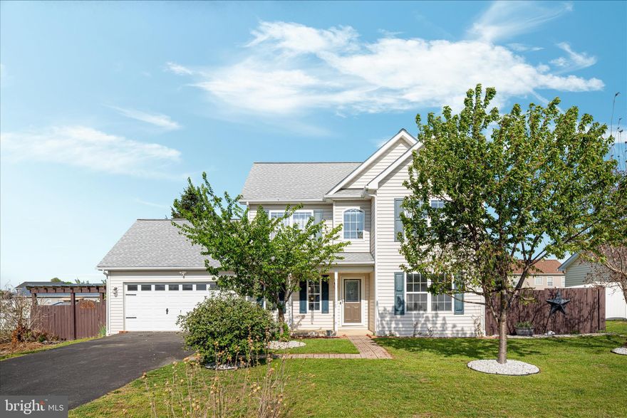 Welcome to 109 Fenimore Dr in the Spring Hill neighborhood of Inwood, WV—an inviting two-level home designed for both comfort and functionality. This well-appointed property features four bedrooms and 2.5 bathrooms, including a primary suite complete with a private bath and a walk-in closet. Convenient second-floor laundry adds ease to your daily routine, keeping everything right where you need it.

The main level offers a thoughtful layout perfect for both everyday living and entertaining. Enjoy cooking in the kitchen with a center island and adjoining breakfast nook, while a separate dining room provides a more formal space for gatherings. Step outside to relax on the charming front porch or unwind in the fenced-in backyard, offering a sense of privacy ideal for outdoor enjoyment.

With a two-car garage and a welcoming community setting, this home blends practicality with comfort—making it a fantastic opportunity in a sought-after location.