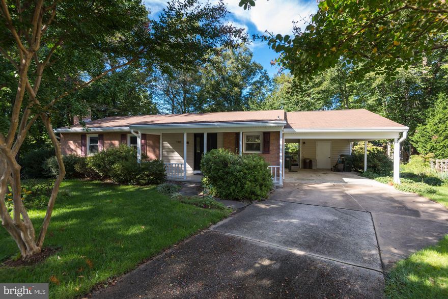 Stunning 5BR/3BA rambler w/new refinished wood floors, bright living room w/large window to deck/yard. Dining room connects to remodeled kitchen (2010) w/cherry cabinets, Cambria quartz counters. Main lvl. includes 3BRs w/remodeled master & hall baths, and spacious sunroom off master BR. Basement incl. family rm. w/new lined gas FP. & backyard access, 2BRs, full BA, more storage. MOTIVATED SELLER!