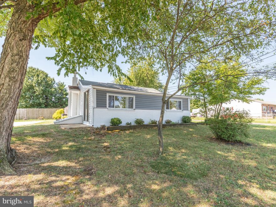 A true example of pride in ownership. Drive up to find a deep-set lot as you are welcomed by a large private concrete driveway. Your walkway will take you to the main entrance which opens to a tastefully revamped living room boasting beautiful exposed beam ceilings and HARWOOD floors throughout. From there you will find a large eat-in kitchen with plenty of room for dining. There is no shortage of counter space, sunshine or cabinetry in the kitchen. Passing back through the living area you will find three well situated main level bedrooms with plenty of closet space. Stepping out to the rear entrance onto a LARGE PATIO offering shade, room for seating and BBQ. The large FULLY FENCED rear yard is a perfect space for a private hideaway, entertaining guests, letting the dogs run or just spending some quality time together. A large shed offers plenty of EXTRA STROAGE and is also ideal for your mower, tools, and extra storage. This home is just a few minutes  walk from Marley Creek. Conveniently located near waterfront entertainment Rams head dockside, and The Beach Bar on Furnace Creek.