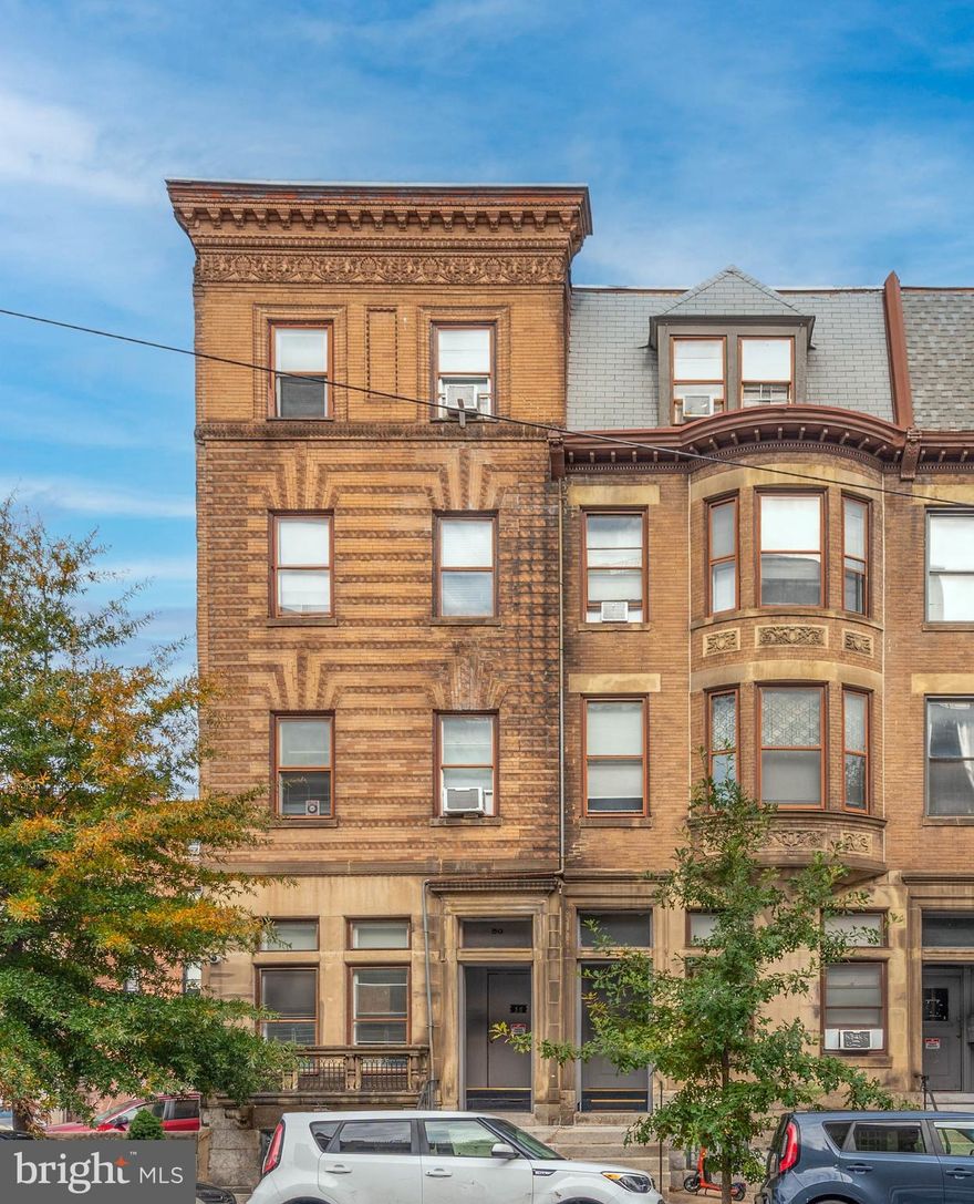 List price to be opening bid at online only auction.  Online auction to be conducted on Auctioneers website. Bidding begins Friday, November 14th & ends Wednesday, November 19th, 2025 at 2:30pm. Substantially Leased Nine Unit Apartment Building in the "Mid-Town Belvedere" Neighborhood of Baltimore City. **Current Gross Monthly Scheduled Rent of $10,361** **Current Gross Annual Scheduled Rent of $124,332** Rental amount includes parking from 2 tenants in the amount of $169/month each as well as a pet rent for 3 tenants as well as water reimbursement from all tenants.  Situated in the heart of Baltimore’s vibrant and historic Mount Vernon neighborhood, 48–50 West Biddle Street offers investors the rare chance to acquire a stabilized, well-maintained nine-unit multifamily property with clear upside potential.  Originally constructed in 1900, the four-story brick building features a mix of (3) studios, (2) one-bedroom/one-bath units, and (4) two-bedroom/two-bath units, totaling approximately 7,486 square feet. Each residence showcases a combination of character and comfort, with white or stainless-steel appliances, wood cabinetry, formica countertops, and hardwood, plank, tile, or carpet flooring. A surface parking lot with four spaces sits conveniently behind the building—two of which are currently underutilized and can be marketed for additional income. Over the past several years, current ownership has completed significant capital improvements, including roof replacements, updated electrical systems, hot water heater replacements, the installation of central HVAC in three units, and washer/dryers in five units. Between 2017 and 2025, ownership has also renovated eight of the nine apartments, leaving one classic unit ready for a new owner to upgrade.  The property maintains strong rental performance, with an average rent of $1,343 per unit and a current occupancy of 100 percent. Residents benefit from spacious layouts averaging 832 square feet, and access to amenities and transit options that are unmatched in the city.