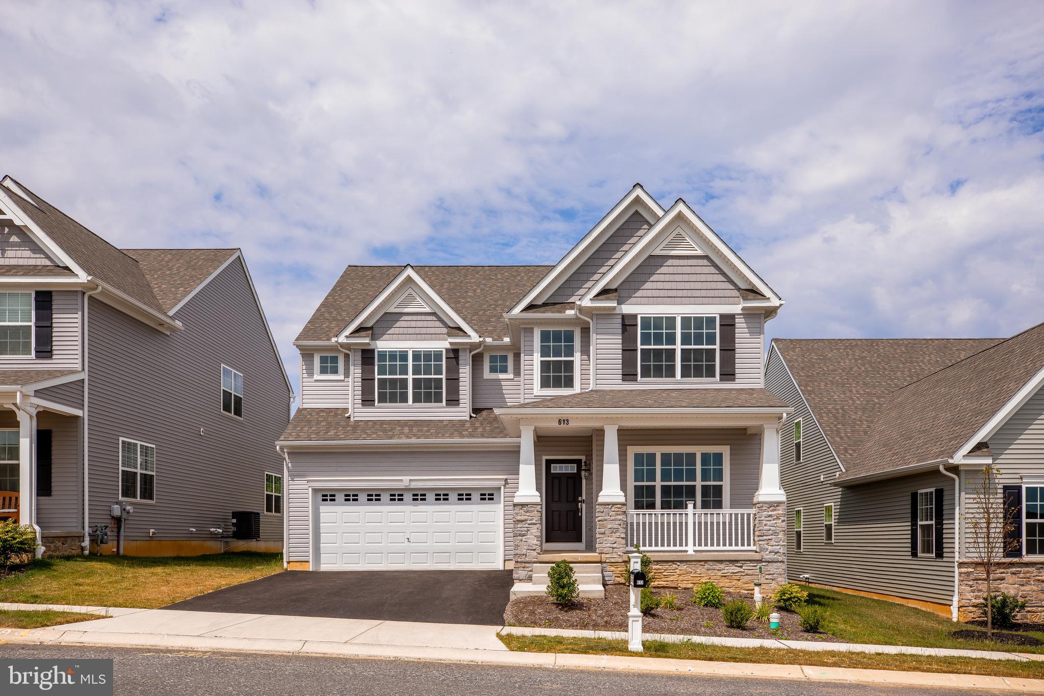 Welcome home! Almost brand new, single family home in popular Manheim Township Schools.  Most desired floor plan (Manchester model) boasts 4 large bedrooms and 2.5 baths. Enjoy the farm views all season long right out your living room with two story high ceiling and lots of natural light.  Turn on the cozy gas fireplace on those cooler nights.  So many upgrades, you cannot build this home at this price plus back up to the farmland.  Granite counter tops with beautiful white cabinets in the kitchen with a great entertaining kitchen island.  Plus the wine fridge!  First floor office space, 9 ft ceilings on first floor and basement, just ready for you to finish.  Basement is also plumbed for a future bathroom.  Spacious master ensuite with 2 large walk in closets and double bowl sinks in bathroom. 20 year builder structural warranty transferable to new owner. Keystone Custom Homes builds energy efficient homes. Such a great home and ready for you to move right in!