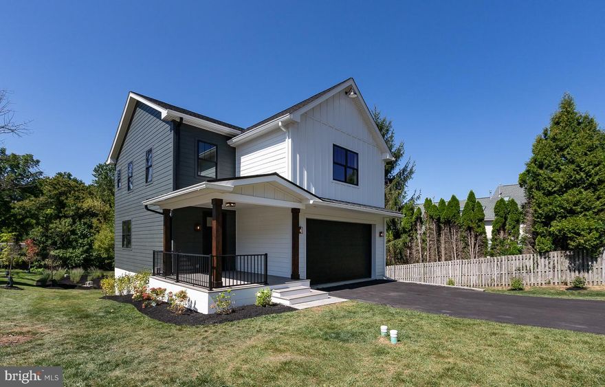 Welcome to The Enclave at St David's. Your new home is waiting. It's rare to find a new construction single family home in one of the top school districts in the state at this price point. This home is Built and Move In Ready. 984 Henry Avenue is part of nine new construction residences in a private enclave near the heart of downtown Wayne. A collection of eight carriage homes and one single-family home, they feature spacious interior living with thoughtful finishes throughout. Live effortlessly between the sanctuary of home and the vibrancy of downtown Wayne’s thriving restaurant scene. This beautiful single family home is located at the end of a quiet cul-de-sac and has 3022 square feet of living space. Four bedrooms, four full baths, and one half bath. The first floor features 10 foot ceilings in the open concept kitchen, dining, living room. A perfect spot to entertain friends and family. The upgraded kitchen boasts a large center island with Calacatta Quartz countertops and a full slab backsplash. GE Cafe series appliances in matte black with upgraded brass hardware. Custom shiplap and white oak hood. Custom white oak open shelving. Bar area with beverage refrigerator and custom white oak shelving. Custom corner dining bench. Shiplap fireplace and TV wall. Off of the kitchen you’ll find your outdoor entertainment area, a 200 square-foot deck that overlooks the beautifully landscaped back yard. Take the custom white oak stairs up to the second floor. On the second floor enter through French doors to find the primary suite. The primary suite is airy and open with soaring 12 foot ceilings. The primary en suite includes a walk in shower with marble mosaic flooring, hand held and rain can, soaking tub, private wash closet, and a large double vanity with Calacatta Quartz top. The large walk-in closet completes the primary suite. Down the hall you'll find a second primary suite with 12 foot ceilings, walk in closet, full bath with a double vanity, linen closet, and tub shower combo. Also on this level, there is a third en suite with 12 foot ceilings, walk-in closet, and full bath.  To complete the second level you'll be happy to find a laundry room with a sink cabinet and folding table. On the lower level, you’ll find  a large fourth bedroom, full bath, and living space. From this space you can walk out to your ground floor patio and back yard. James Hardie siding, black Andersen windows, Azek Vintage Collection decking, Shaw Couture white oak wide plank flooring, upgraded GE Cafe appliances. Located in the award-winning Tredyffrin Easttown school district. Close to the train station, freeways, and King Of Prussia shopping and dining. Don’t miss this opportunity to live in a beautiful new construction single family home, in a top school district in the state, close to all of the amenities that Wayne has to offer. This home is built and move-in ready. All you have to do is pack your bags. Taxes TBD. The development is 90% complete and no exterior construction.