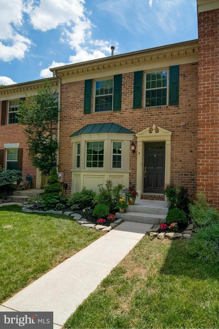 Nicely updated Kitchen w/new SS Appliances* Hardwood Floors on main level* Spacious Living Room w/Wood Burning Fireplace and sliders to rear deck overlooking private rear yard backing to large common area* Gorgeous Bathroom Renovations* Finished LL w/Family Room, 4th Br/Den & Half Bath walks out to patio* Some updates include Roof, Windows, Sliders & more* Unique 8 Home Court has quiet cul-de-sac!