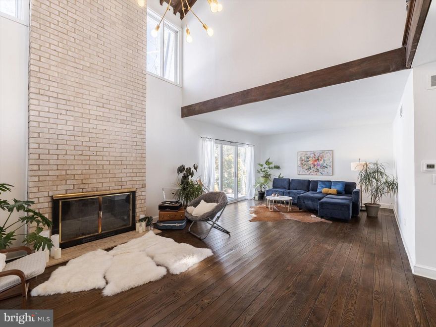 Looking for a light-filled home that is both modern and unique, welcome to 919 Laburnum Lane, an original mid-century home built in 1963 and lovingly renovated in 2025. Tucked away in a quiet street just off Church Road, this unique mid-century French carriage house–inspired residence was custom-designed by architect Santo J. Lipari, renowned for his exhibition Form, Design and the City. Recently renovated with a brand-new roof and siding, newly updated bathrooms, the home blends timeless mid-century characters with modern updates, featuring original hardwood floors, a grand staircase with its original metal bannister, and expansive living areas filled with natural light. 
The main level offers an eat-in kitchen flows seamlessly into the open dining and living areas, highlighted by a brick fireplace, high ceilings, and two large sliding glass doors that open to a flagstone patio—perfect for indoor-outdoor entertaining. Outside, the nearly three-quarter-acre, tree-lined lot includes a large detached two-car garage and ample green space. This first-floor level also has a private study or guest bedroom with custom built-ins right next to a stylish half bath, creating an ideal work-from-home or flex-space setup for first floor living. 
Upstairs, you’ll find four large and bright bedrooms with lots of closet space, tall windows and two full baths, thoughtfully arranged to allow easy conversion into primary bedroom suites. These bedrooms are filled with classic mid-century windows, giving the room access to natural lights throughout the day while preserving the sense of privacy and comfort.
With over 3000 square feet of livingroom and high ceiling throughout, 919 Laburnum Lane offers an open living space with so much room to accommodate the most comfortable living arrangement, whether it is a growing family, or a multi-generational home with spaces for everyone. And if you need more space, the full high-ceiling walk-out basement could be finished to add more living or working space. 
Conveniently located near the restaurants and shops of Jenkintown Borough and just a short drive to the Jenkintown–Wyncote SEPTA Regional Rail station. Locating in a good school district and within just minutes from the city, this green oasis with access to forest-like setting and wild life is the perfect place to call home.