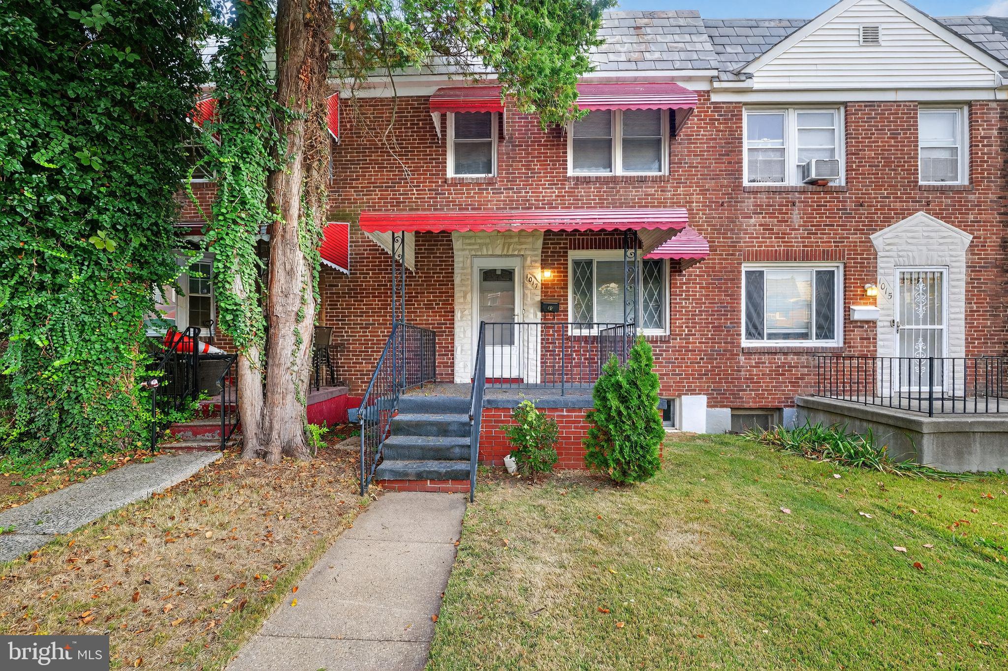 Welcome to this beautifully updated brick townhome in the desirable Rognel Heights community! Offering 3 spacious bedrooms and 2.5 baths, this home blends classic Baltimore charm with modern comfort. The main level features a bright living room, a separate dining area, and a stylish kitchen with ample cabinet space. Upstairs, enjoy well-sized bedrooms and a full bath, while the finished lower level provides a versatile family room, half bath, and an additional full bath—perfect for guests or extra living space. Step outside to a fenced rear yard ideal for relaxing or entertaining, plus a convenient rear parking pad. Located near local parks, shopping, and commuter routes, this home is move-in ready and perfect for today’s lifestyle.