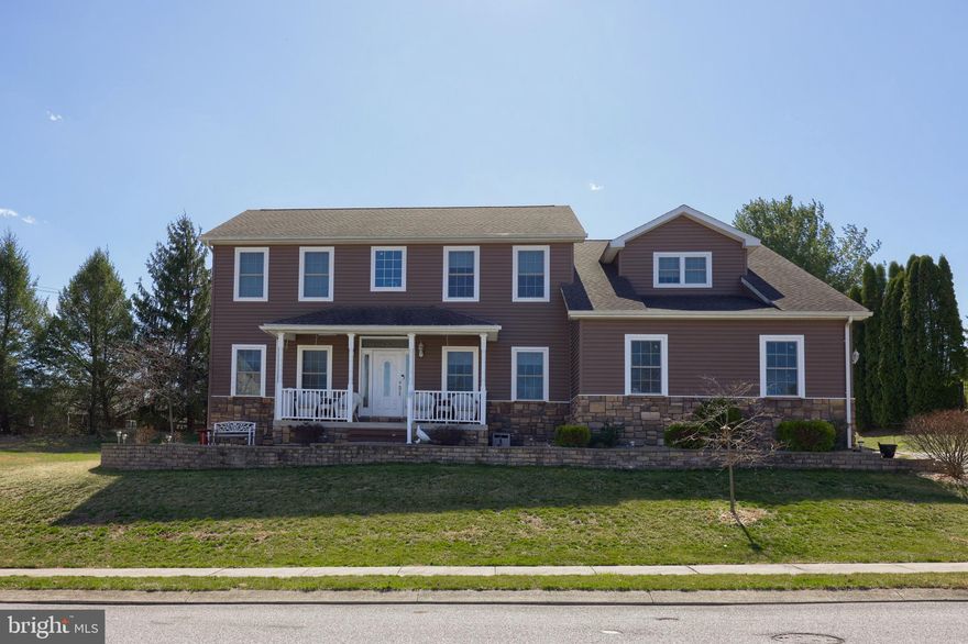 Check out this move in ready home in Dallastown schools boasting over 3400 sq ft of finished living space! Situated on a corner lot in a cul-de-sac neighborhood, this gorgeous home offers modern fixtures throughout and a finished lower level! The main level features Pergo flooring throughout, a family room that flows seamlessly into the kitchen - making entertaining a breeze, a formal dining room, and a den! The kitchen and dining room features gorgeous coffered ceilings and the den is a great place to relax with a built-in bar area. The chef in the family will love the eat-in kitchen with stainless steel appliances, soft-close cabinetry, a center island, and  breakfast area. The upper level offers a spacious primary suite with a 10’ x 11’ walk-in closet and an additional walk-in closet. The primary bathroom features a soaking tub, walk-in shower, and dual vanities. Three additional bedrooms all include dual closets, and a full guest bathroom completes the upper level.The lower level offers a versatile space for relaxation and entertainment, featuring a finished rec room, half bath, and a spacious workshop. Just in time for warmer weather - the backyard offers an expansive deck and patio area. Solar panels are discretely located on the rear of the home and offer the opportunity for lower electric bills! Great location - close to Apple Hill Medical Center, York Hospital, York College, York Country Day School, and the York County Heritage Rail Trail. Easy commute to I-83 and the PA/MD line.