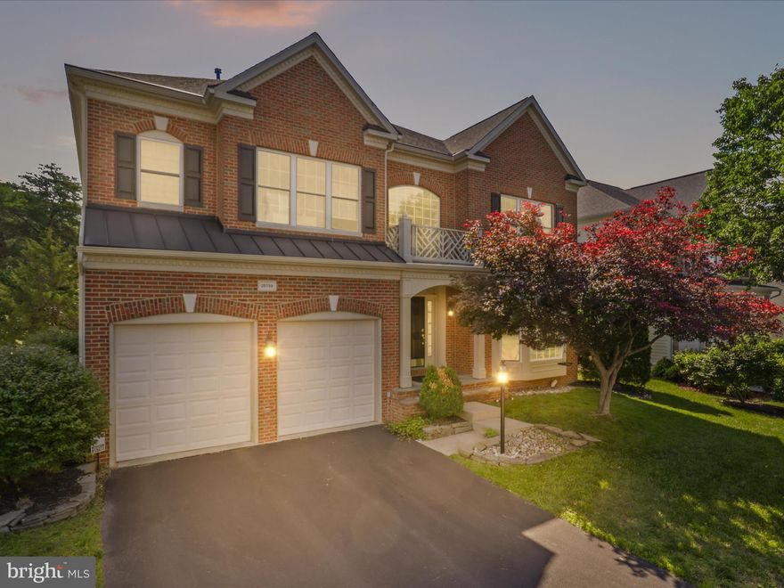 Welcome to 25738 S Village Dr, a stunning 5-bedroom, 5-bathroom home offering 4,656 square feet of beautifully finished living space in the heart of South Riding.  This home boasts over $50,000 in upgrades, showcasing exceptional care and modern enhancements throughout. 
Step inside to discover a light-filled open floor plan, featuring refinished hardwood floors throughout the main level and stairways (2021), formal living and dining rooms, and a spacious family room with a cozy fireplace. The gourmet kitchen boasts granite countertops, stainless steel appliances, and ample cabinet space.
Upstairs, the expansive primary suite is a true retreat, featuring two separate walk-in closets and a spa-like bath with a recently updated shower and new glass enclosure. Additional bedrooms are generously sized, offering comfort and versatility for any lifestyle.
The fully finished lower level includes a private in-law suite with its own full bath, living area, and separate entrance—ideal for extended family, guests, or flexible use of space.
Enjoy outdoor living on your new deck built in 2021, complete with stairs that lead down to a beautifully landscaped backyard—perfect for entertaining, relaxing, or enjoying warm summer evenings. The HVAC system, installed in 2014, has been meticulously maintained for optimal performance. The main floor and upstairs bedrooms feature motorized automatic shades valued at over $10,000, offering both convenience and luxury. Additionally, the upstairs bathrooms are equipped with smart toilets, adding a high-tech touch to everyday living.
Conveniently located near top-rated schools, shopping, dining, and major commuter routes, this home is a rare gem in one of Loudoun County’s most desirable communities.
