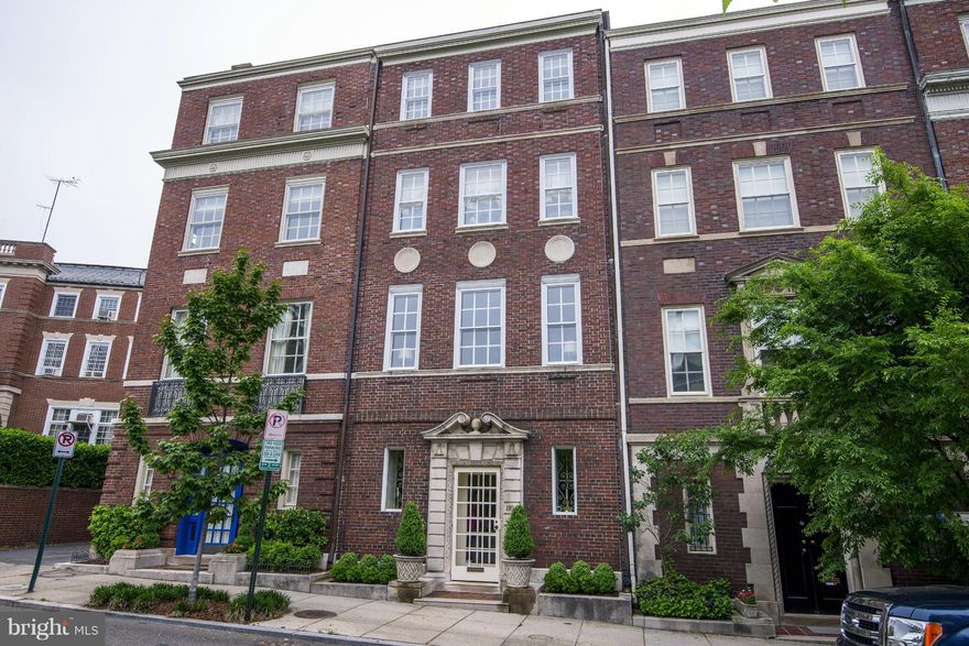 Elegant and well-appointed townhouse restored by top designers. Magnificent proportions enhanced by natural light and elaborate moldings. Dining room French doors open to private patio. 3 BR w/ potential for 4th. His/her private offices. Library with built-in bookshelves. Comfort and grandeur plus. two-car garage, Walk to metro.