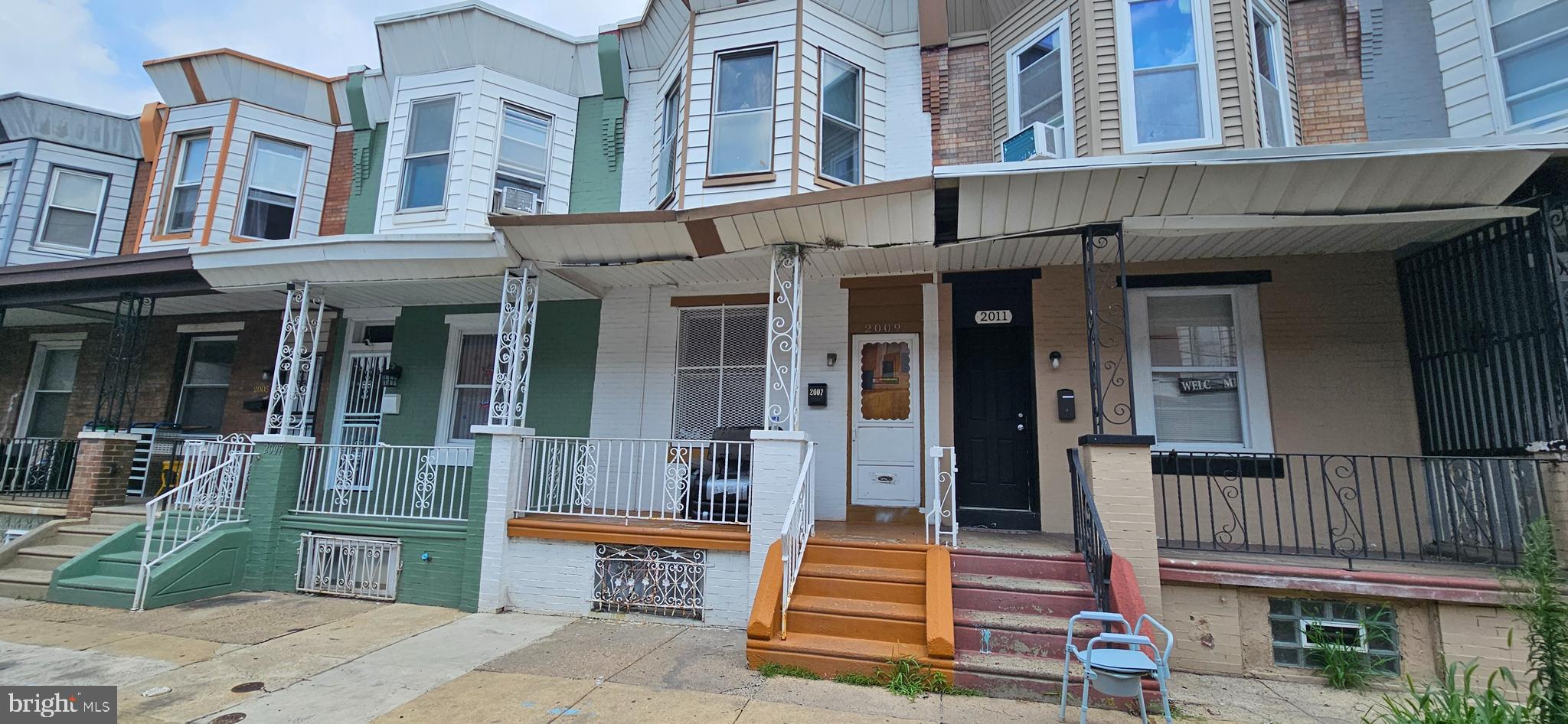 Welcome to this 3-bedroom, 1-bath straight-thru style townhouse nestled in the heart of Kensington. This home offers a classic layout with spacious living and dining areas, perfect for everyday living and entertaining. The kitchen flows seamlessly to the rear of the home, maintaining the desirable straight-thru floorplan. Upstairs, you'll find three comfortably sized bedrooms and a full hall bath. The property is equipped with a natural gas hot water heater and gas heating system for year-round comfort. Street parking is available. Home being sold As-Is.
