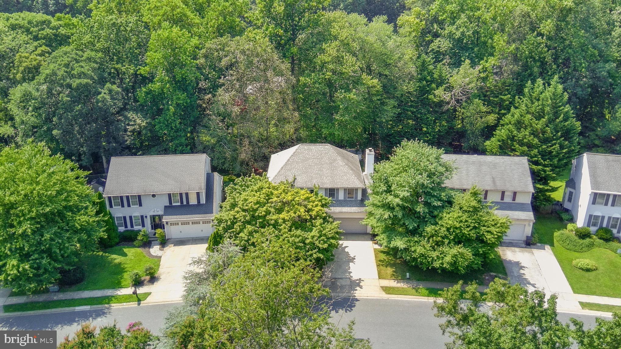 Welcome to this 4 bed, 2.5 bath single family home with a two car garage in Patterson Mill schools in the neighborhood of Singer Woods. Pull into the driveway, and or park in the two car garage, and take the short walkway to the front door. Entering through the front door brings you to a foyer with wood flooring stretching out in all directions. To the left is a large step down living room which then flows into a formal dining room with chair rail trim and carousel windows that allow for tons of ambient light. The kitchen is off of the dining room which has tiled flooring, custom cabinetry, pantry, subway tile backsplash, a massive granite island, stainless appliances, granite countertops and breakfast bar overlooking the living room. This kitchen is open concept overlooking both the carpeted second living room with its own fireplace, and the tiled sunroom which can serve as either a living space or casual dining area. The sun room/florida room has vaulted ceilings, tons of windows, and doors that open out onto the rear deck. The large wooden deck stand the entire back of the home and has stairs that walk down into the fully fenced rear yard that backs to woods and comes with a storage shed. Back inside the kitchen circles into the living room which circles back into the main hallway which includes a convenient first floor powder room, as well as the exit into the two car garage. Taking the stairs to the second floor brings you to a carpeted level with two bedrooms joined by a Jack and Jill style bathroom with a tub/shower combo, as well as another third bedroom/office. Down the hall is the private owners suite with its own private bath with a walk in shower, jacuzzi style soaking tub, and double vanity as well as a walk in closet. There is also convenient laundry facilities on this top level.
Heading into the basement brings you to a massive unfinished area with mechanicals, including a radon remediation system and tons of room for storage. Or this basement can be a blank canvas to be finished using your imagination. This home is located just seconds from Rt 24 and only a couple minutes from I95 and a few minutes from downtown Bel Air. There are tons of shopping and dining options nearby. This is the one! Come see it today!